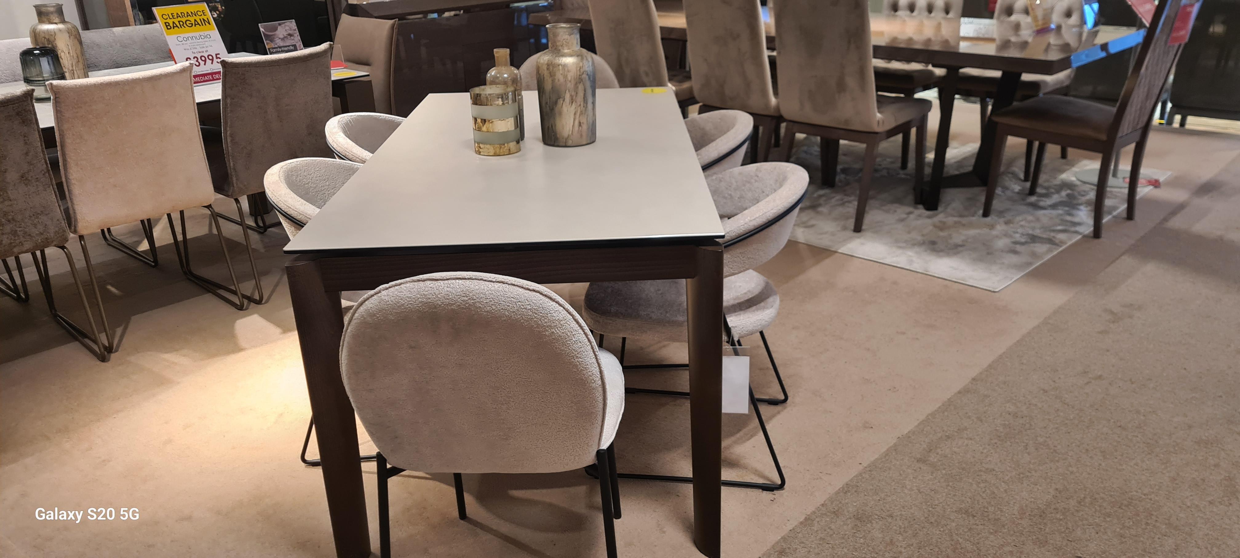 Rosa ceramic extending table and 6 chairs in  on Furniture Village
