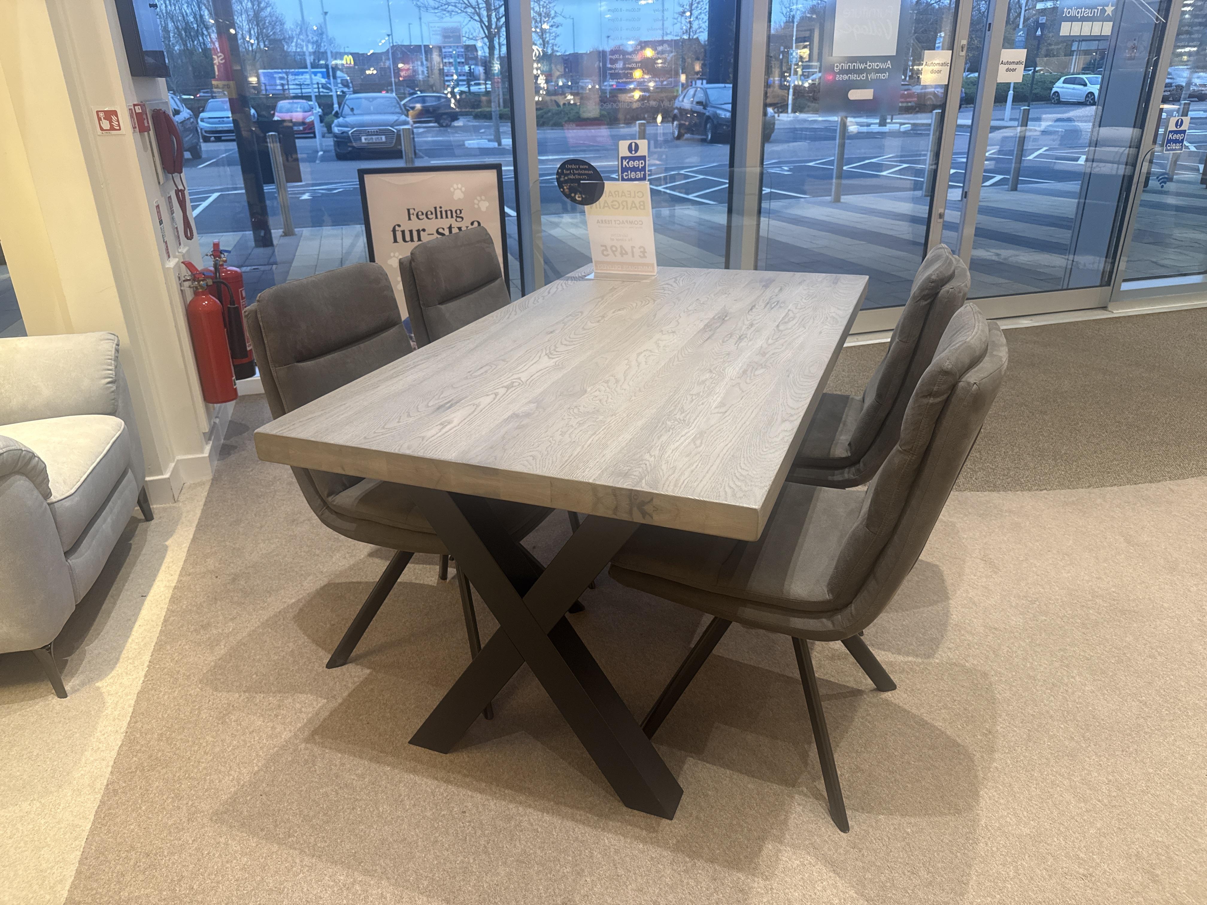 Compact Terra table and 4 chairs in  on Furniture Village