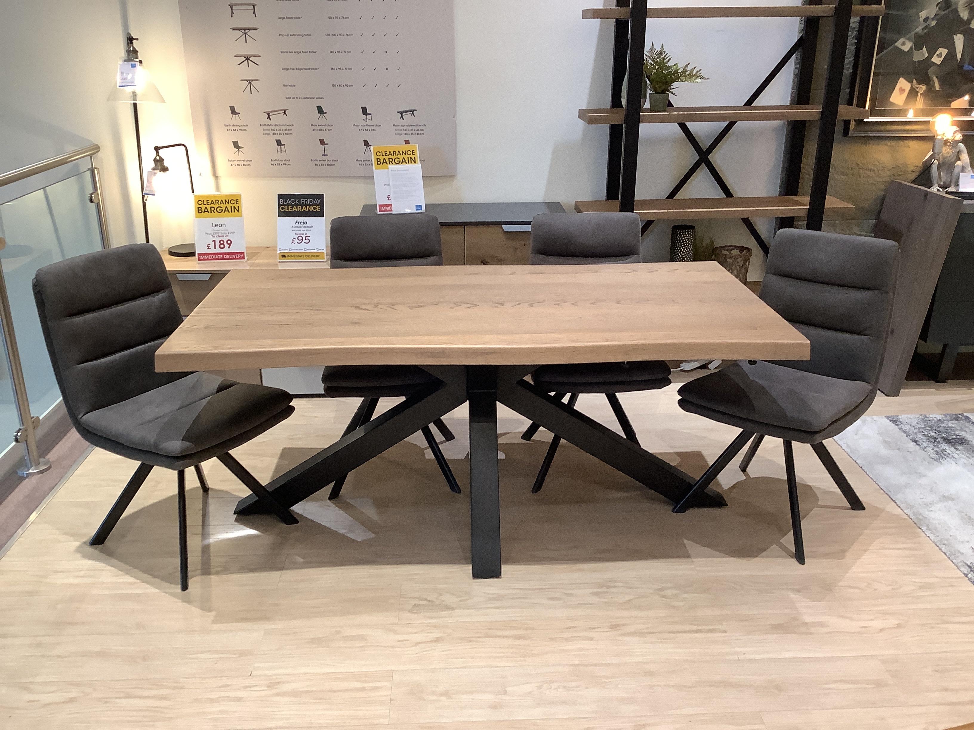 Saturn Table and 4 Njord Swivel Chairs in  on Furniture Village