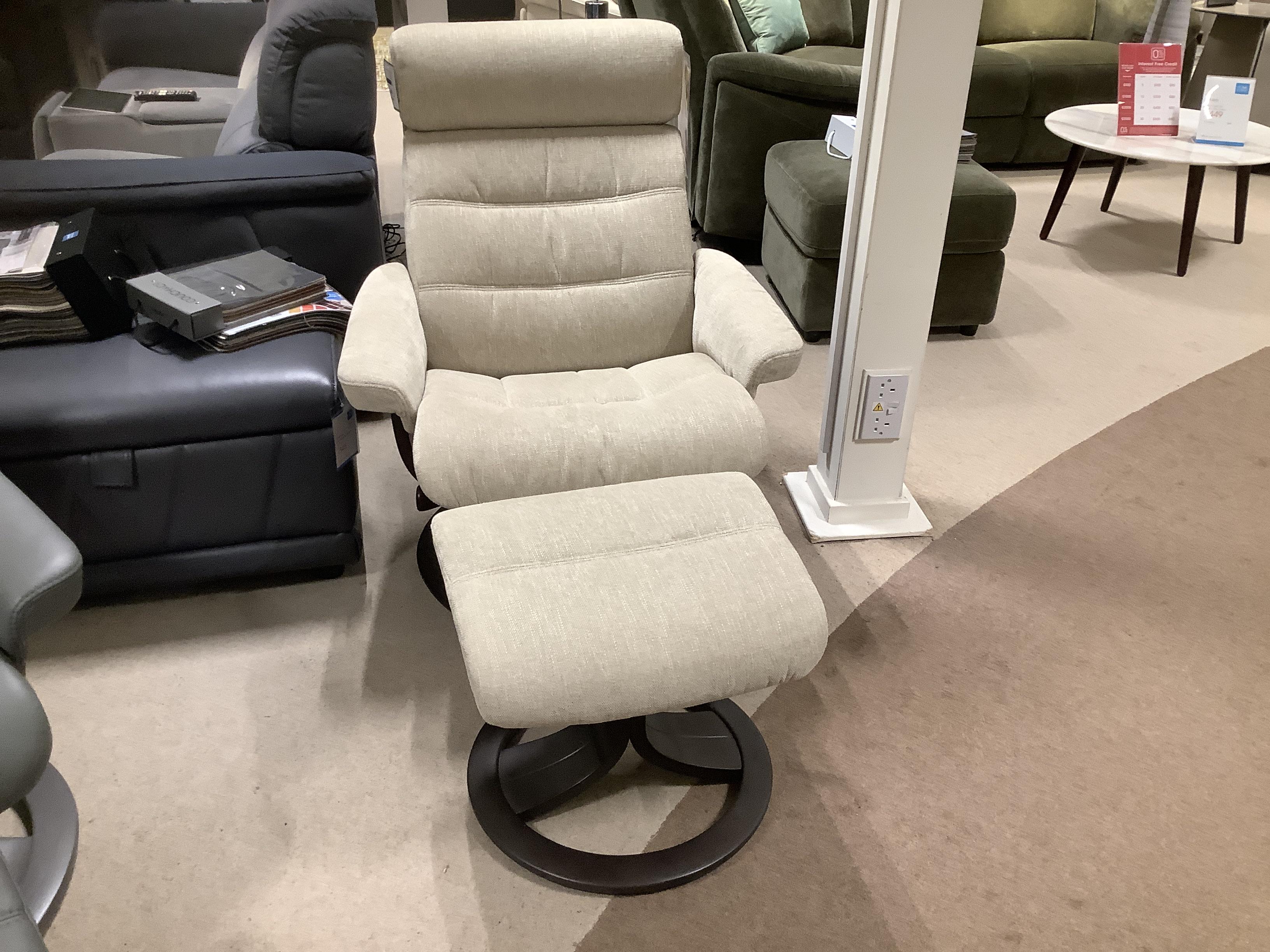 Odense large swivel recliner chair and stool in  on Furniture Village