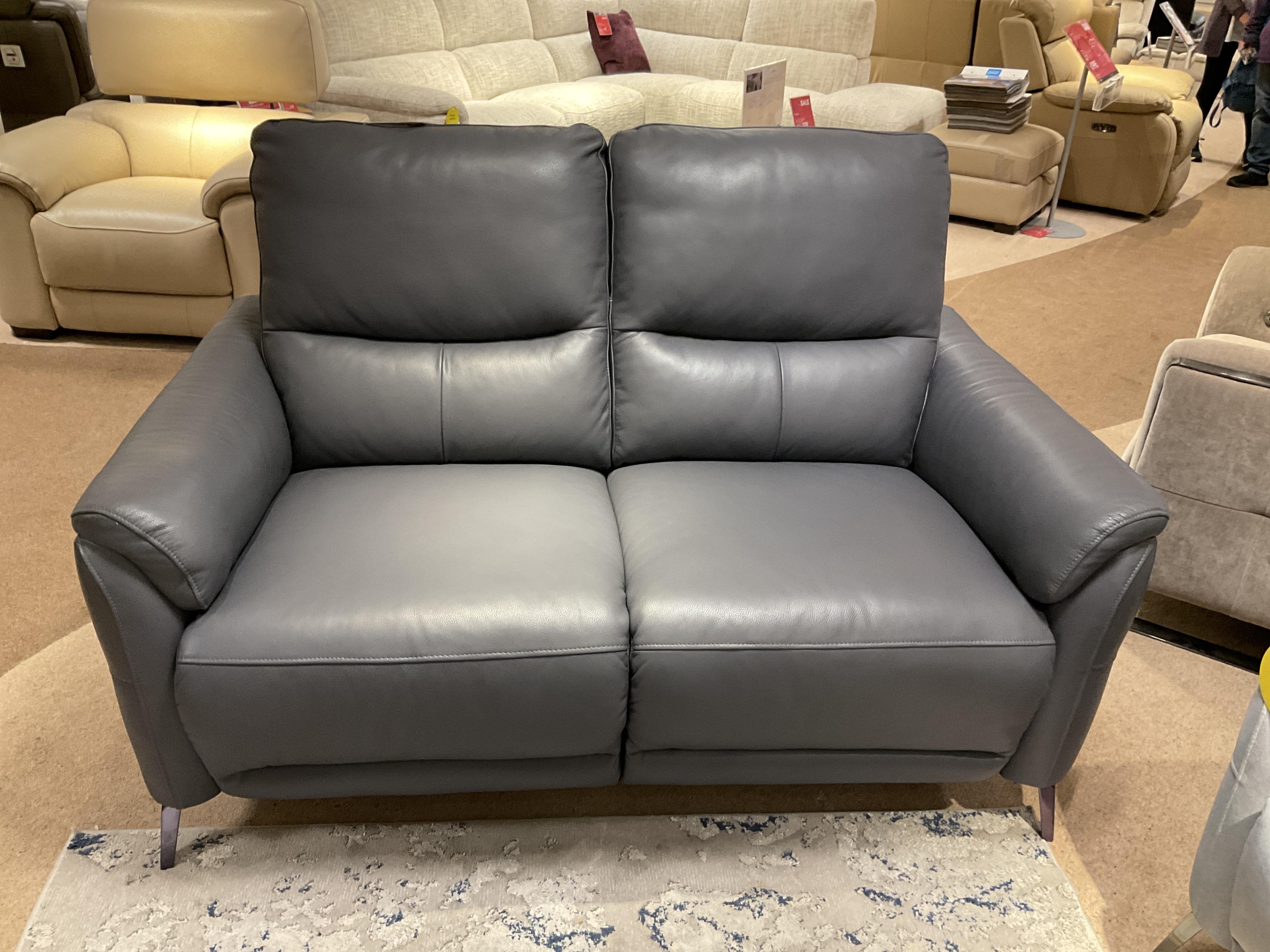 DAYTONA 2 SEATER AND FOOTSTOOLS IN LEATHER in  on Furniture Village