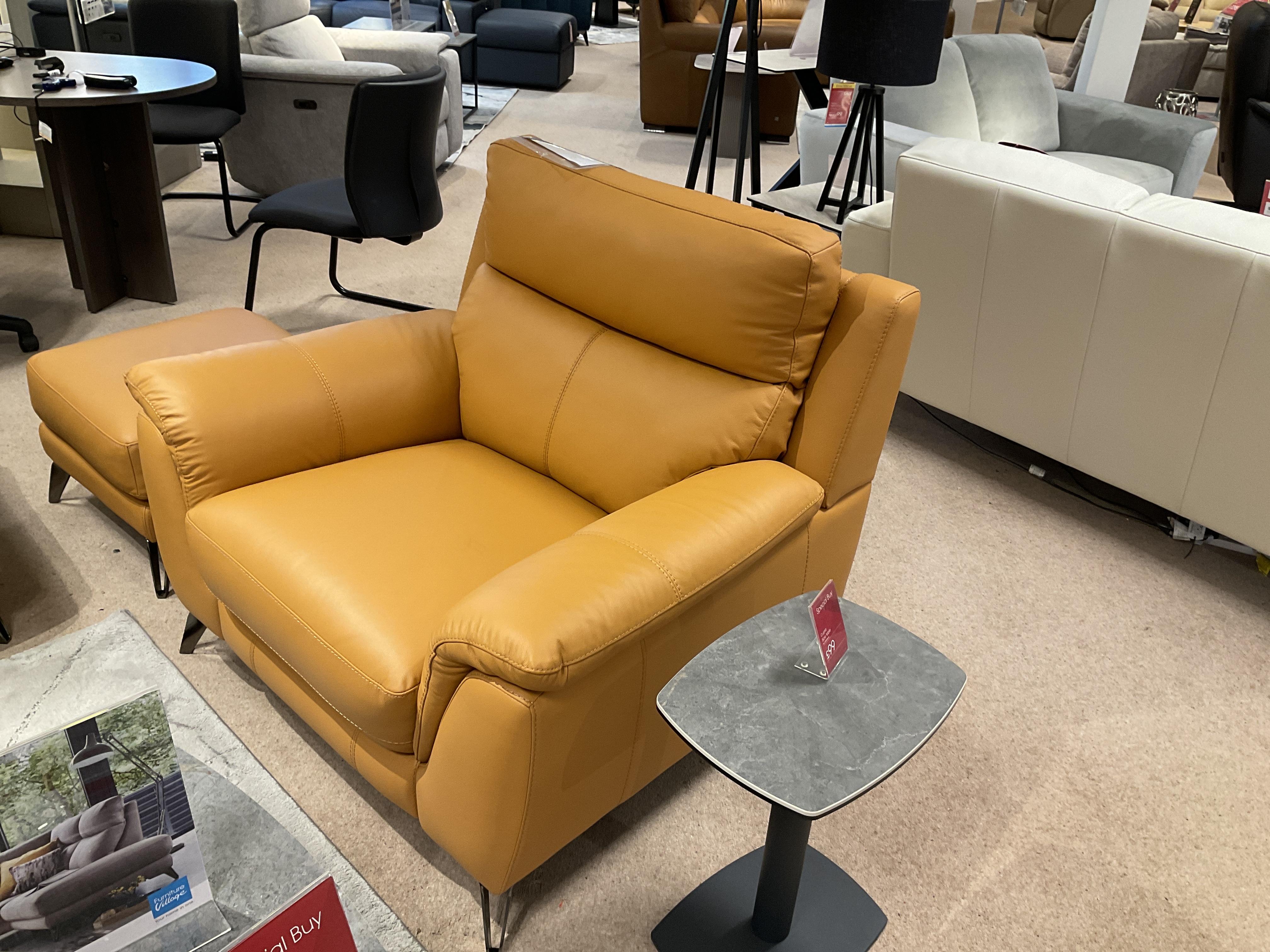 CONTEMPO ARMCHAIR AND FOOTSTOOL IN LEATHER in  on Furniture Village