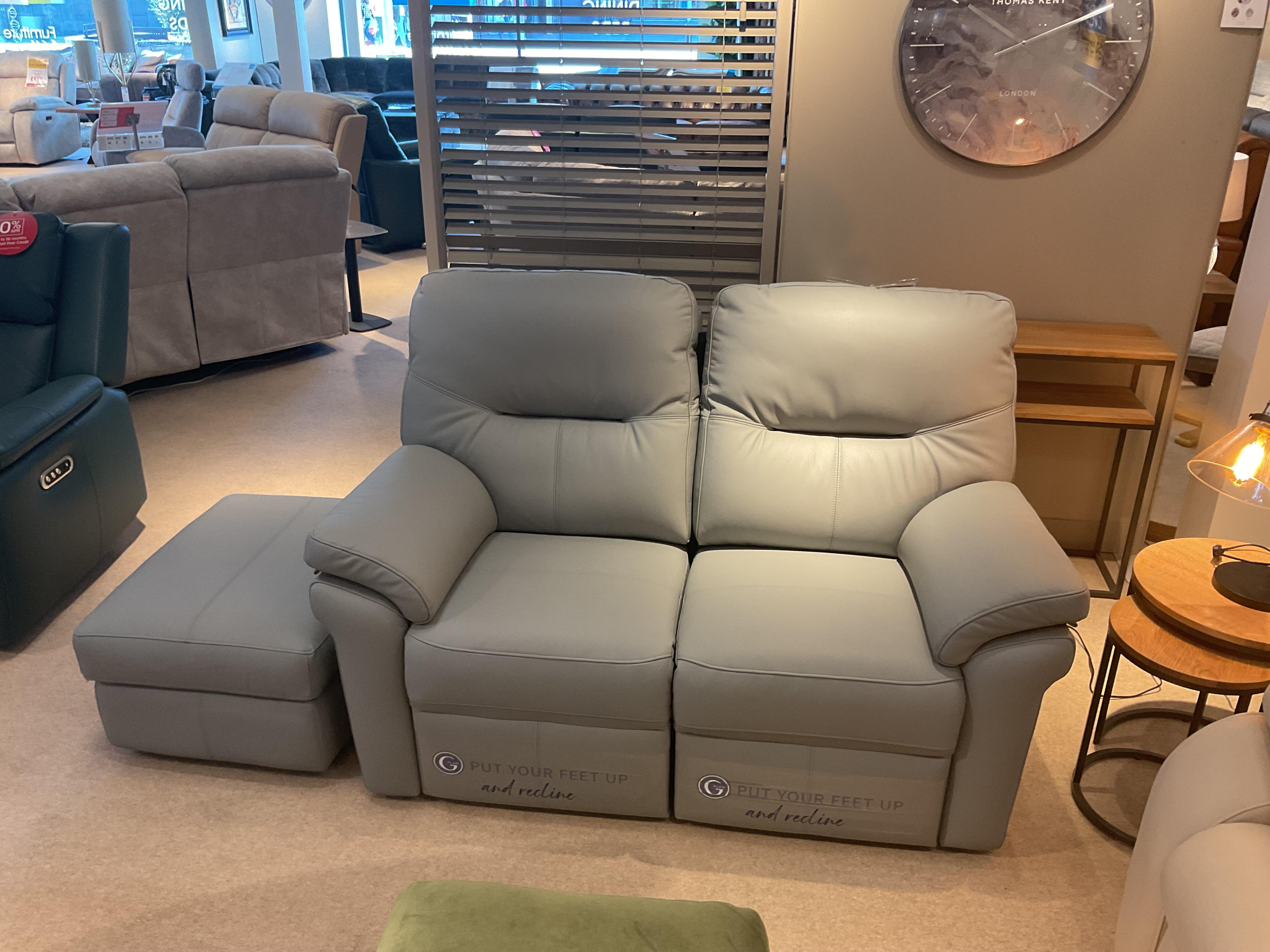 Seattle 2seater power recliner and storage stool in  on Furniture Village