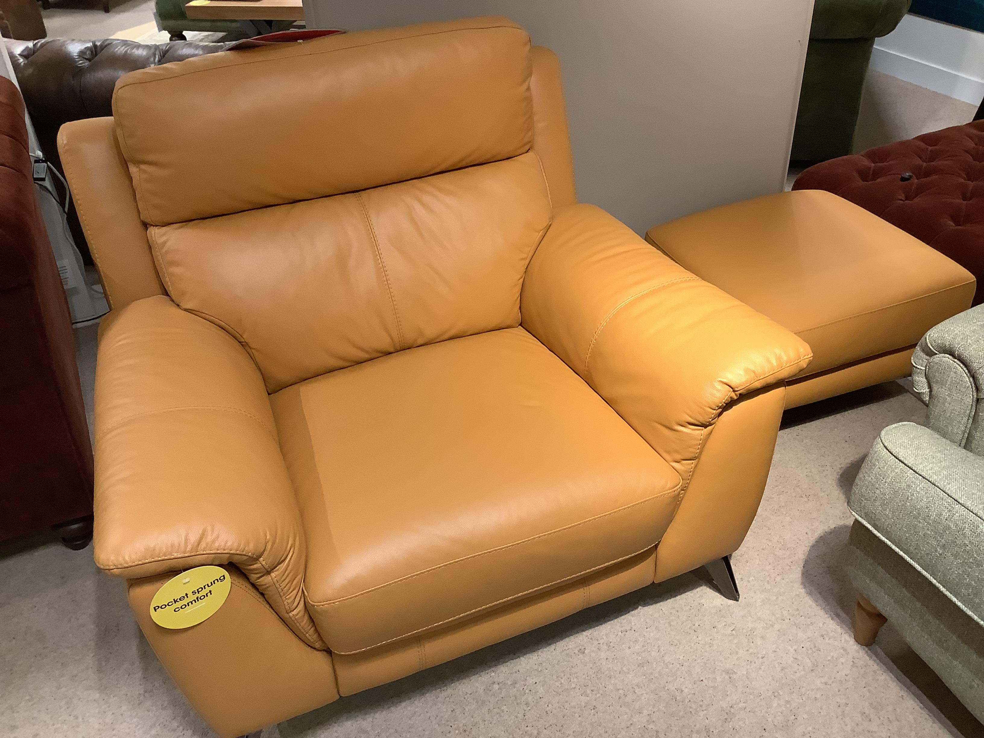 Contempo leather chair & footstool in  on Furniture Village