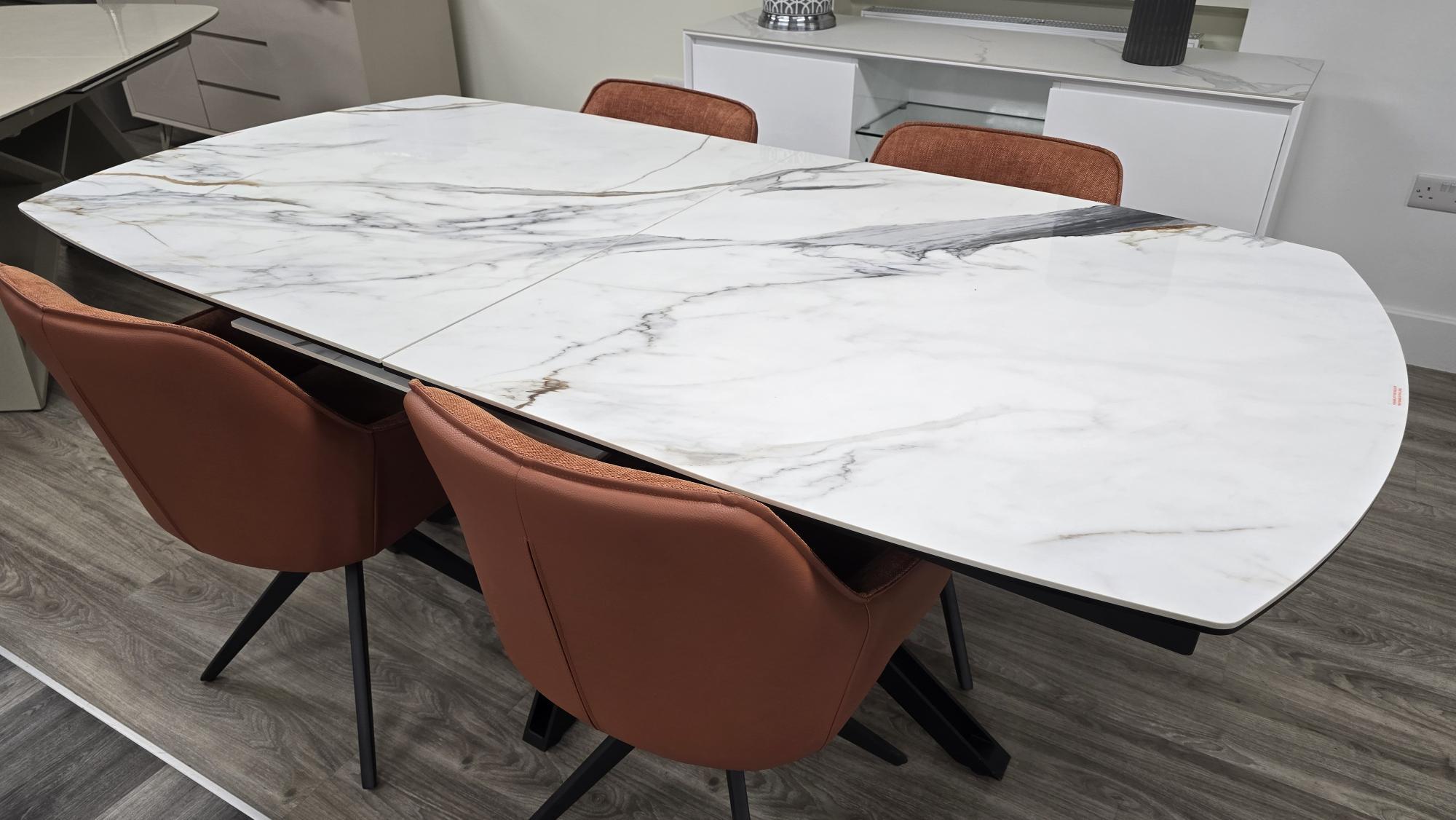 Jose table + 4 orange chairs in  on Furniture Village
