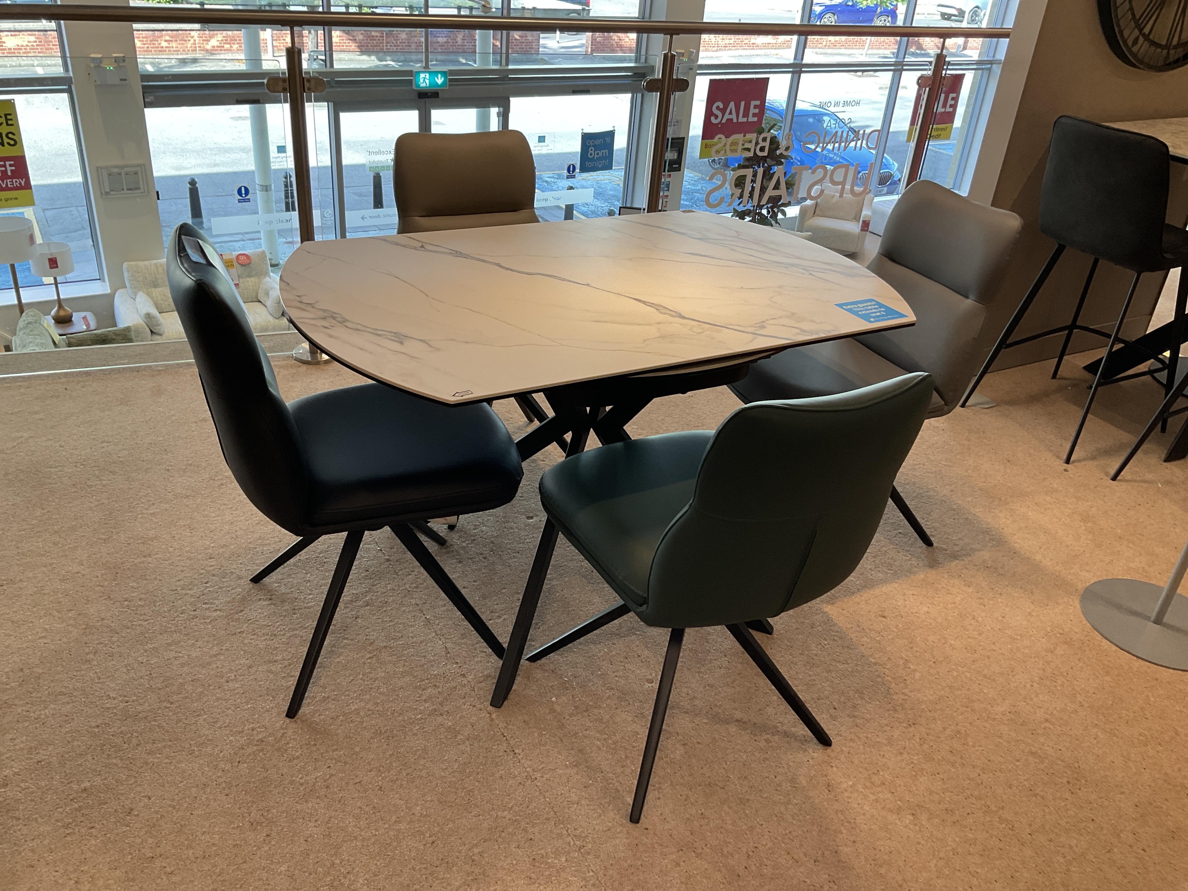 QUATTRO SWIVEL TABLE AND 4 CHAIRS in  on Furniture Village