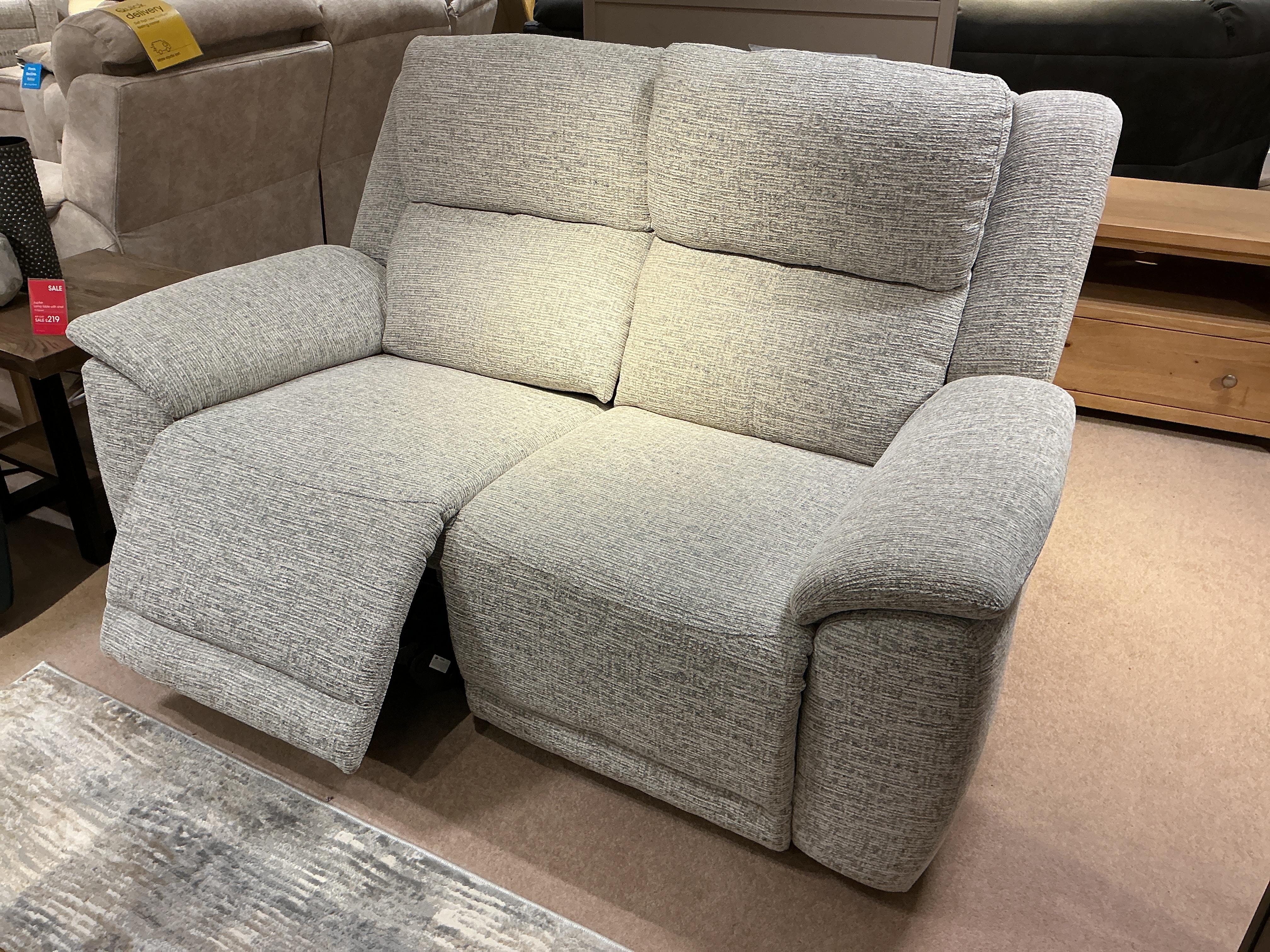 Utah 2 seater power sofa and storage stool in  on Furniture Village