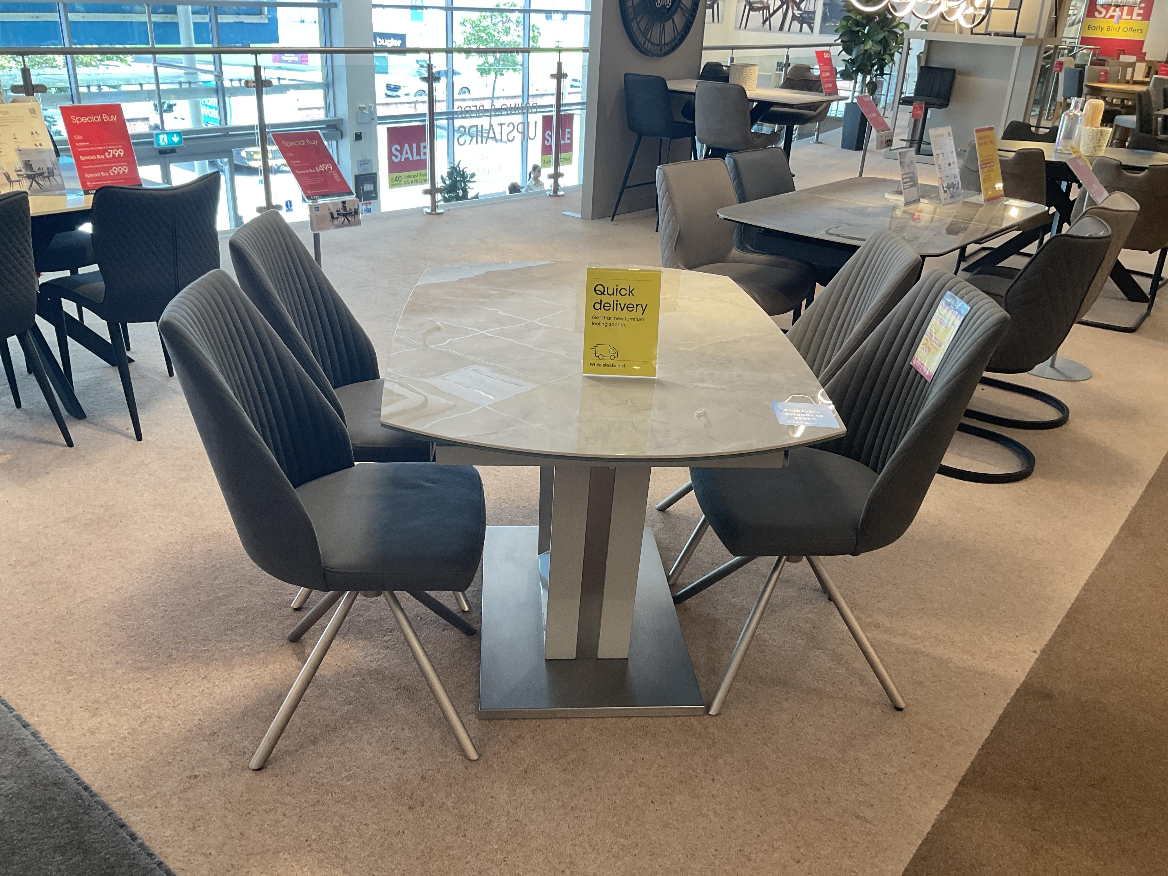 GRIGIO SWIVEL TABLE AND 4 CHAIRS in  on Furniture Village
