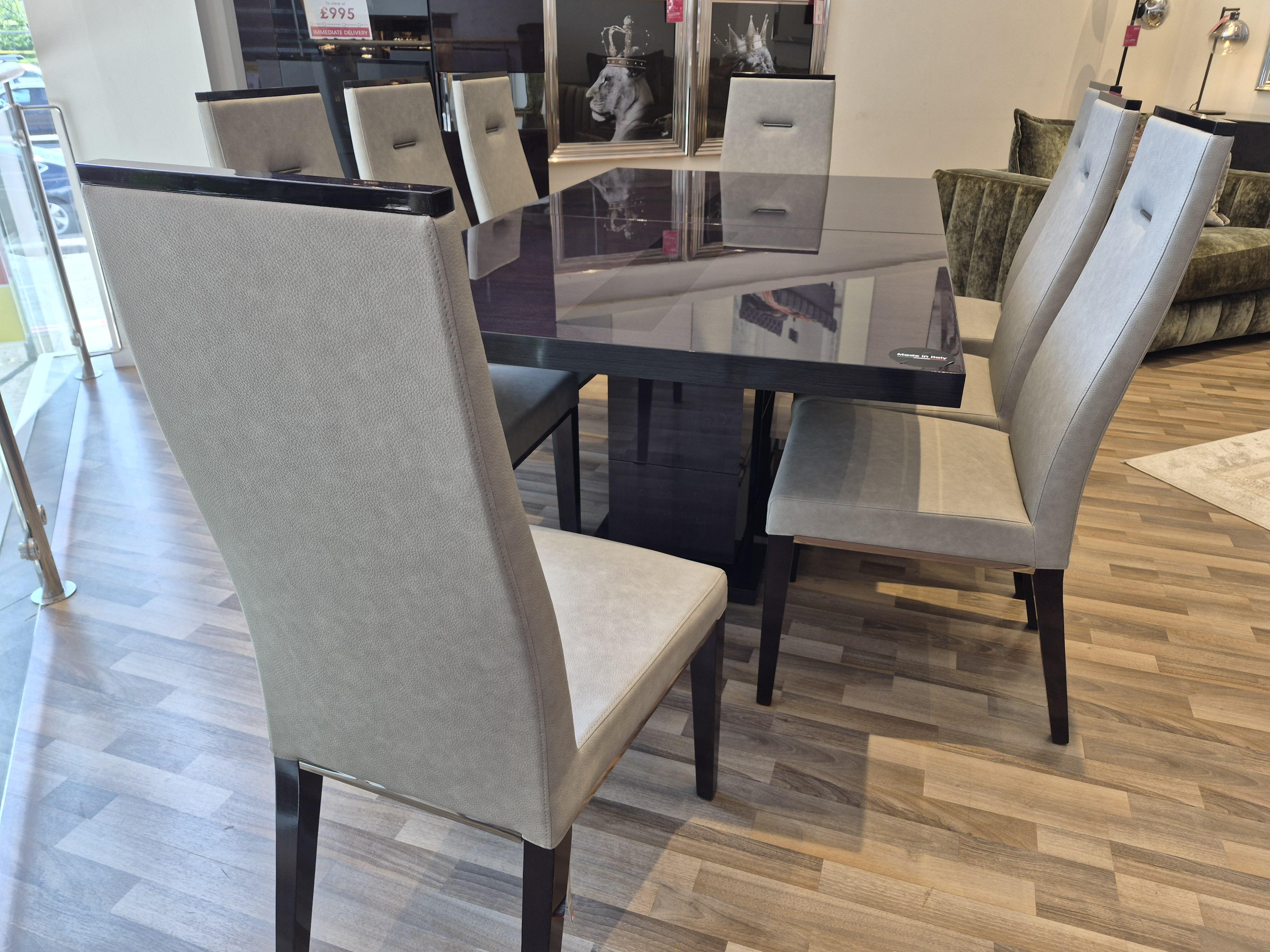 Avellino dining table with 8 chair and sideboard in  on Furniture Village