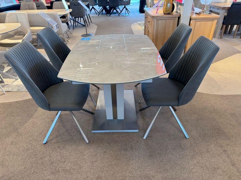 Grigio swivel extending table & 4 swivel chairs in  on Furniture Village