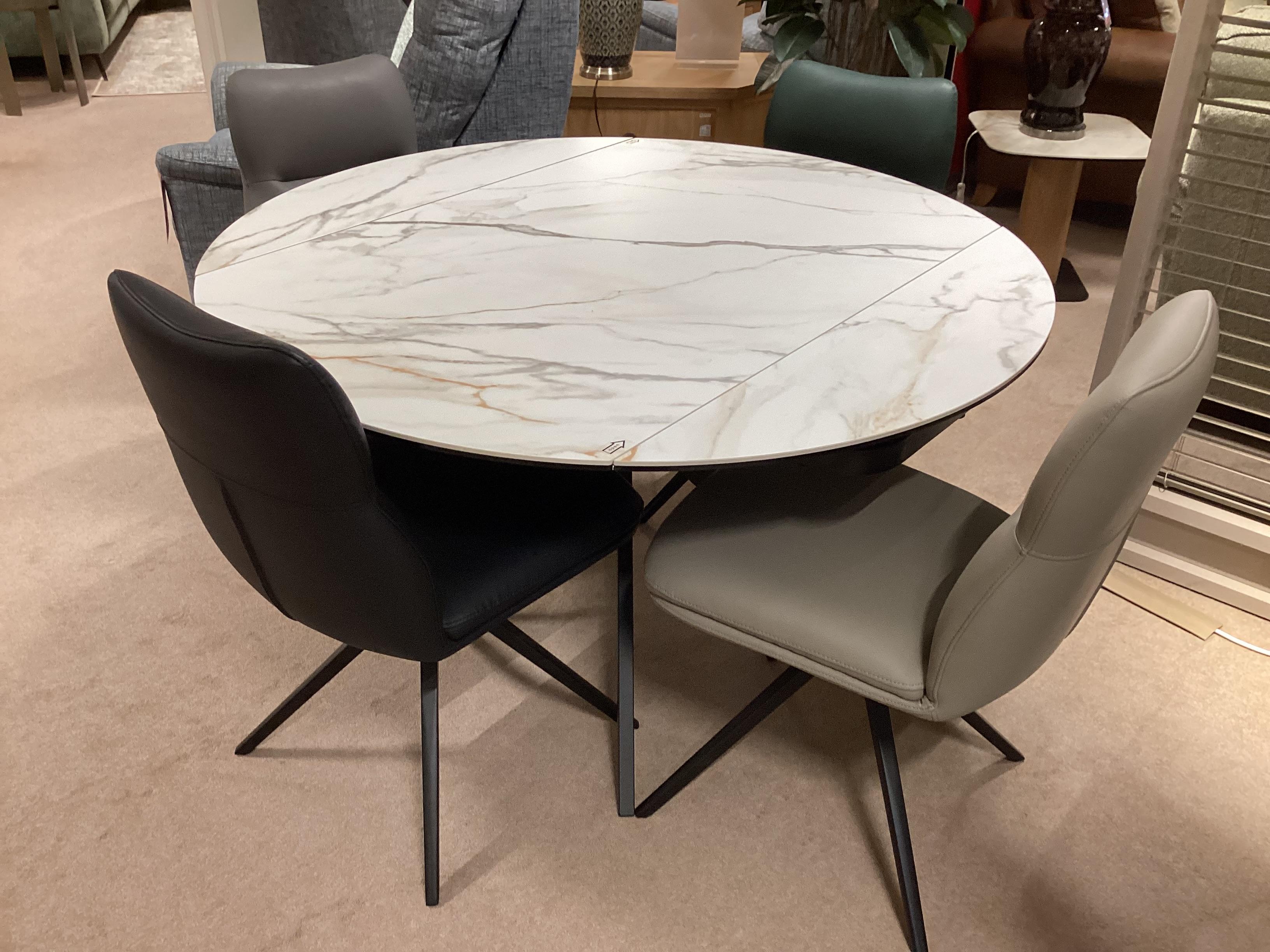 Quattro Extending swivel table and 4 chairs in  on Furniture Village
