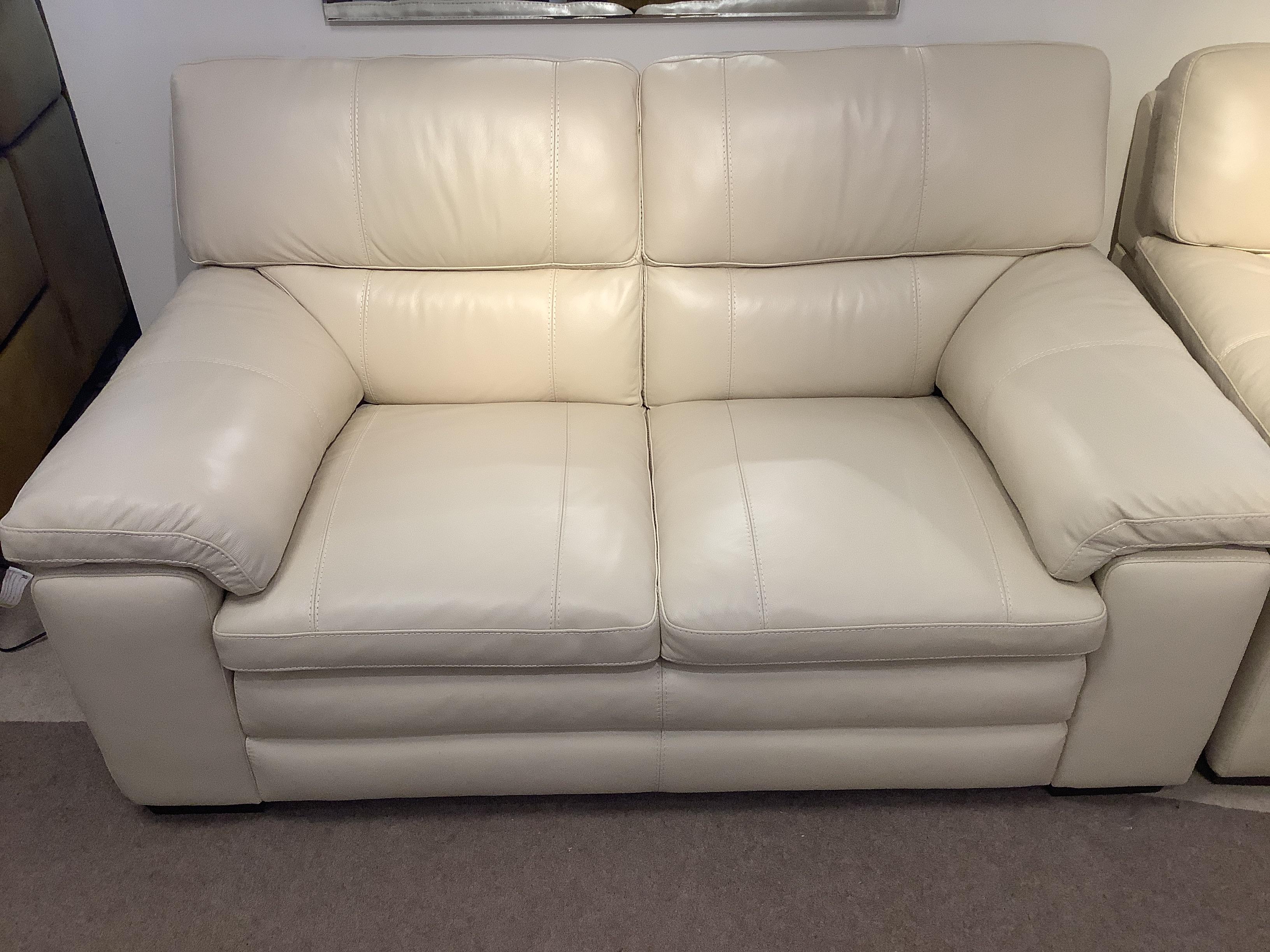 Cozee 2 seater leather sofa x 2, and foot stool in  on Furniture Village