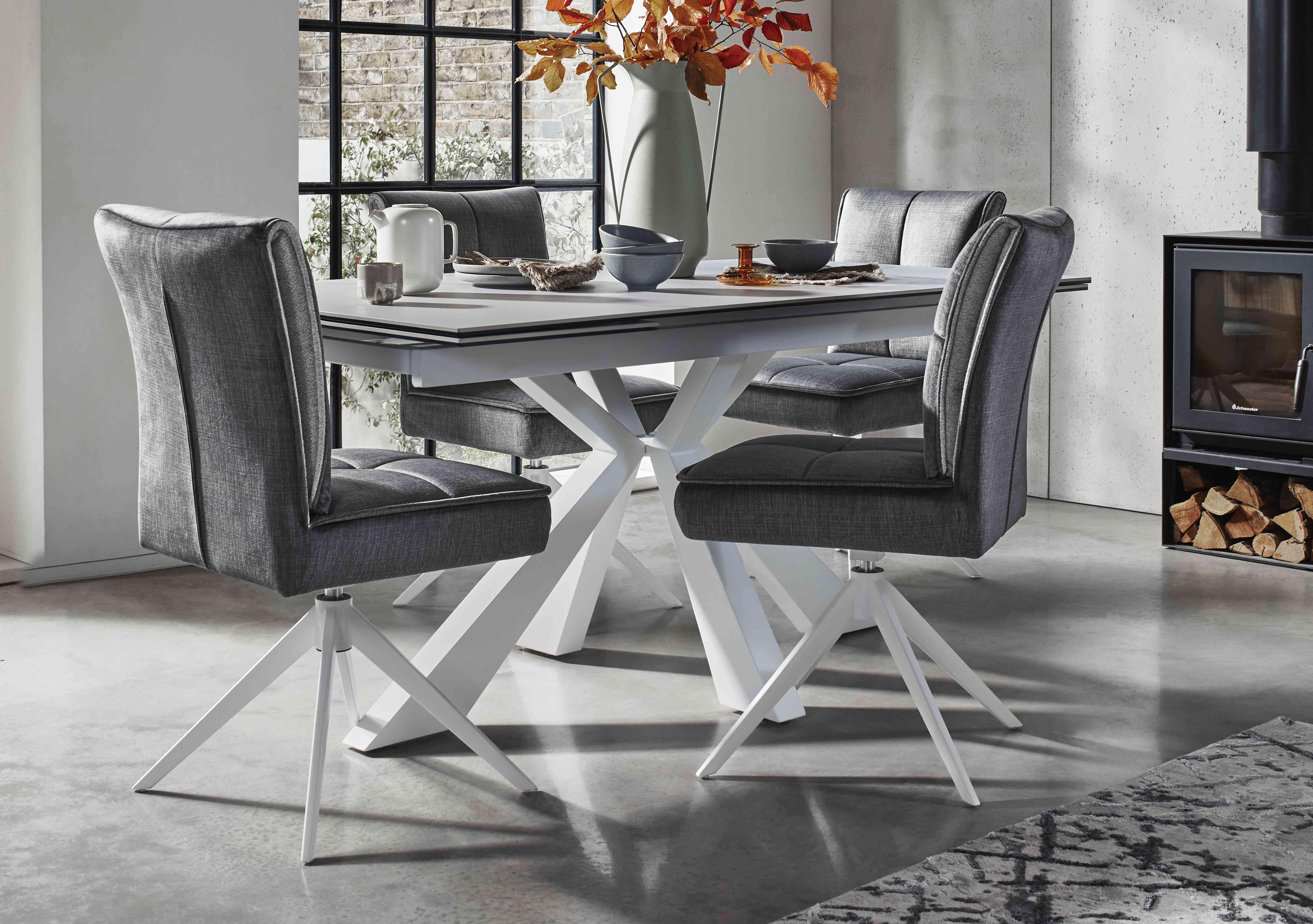 Glacier Small Extending Dining Table and 4 Swivel Dining Chairs in  on Furniture Village