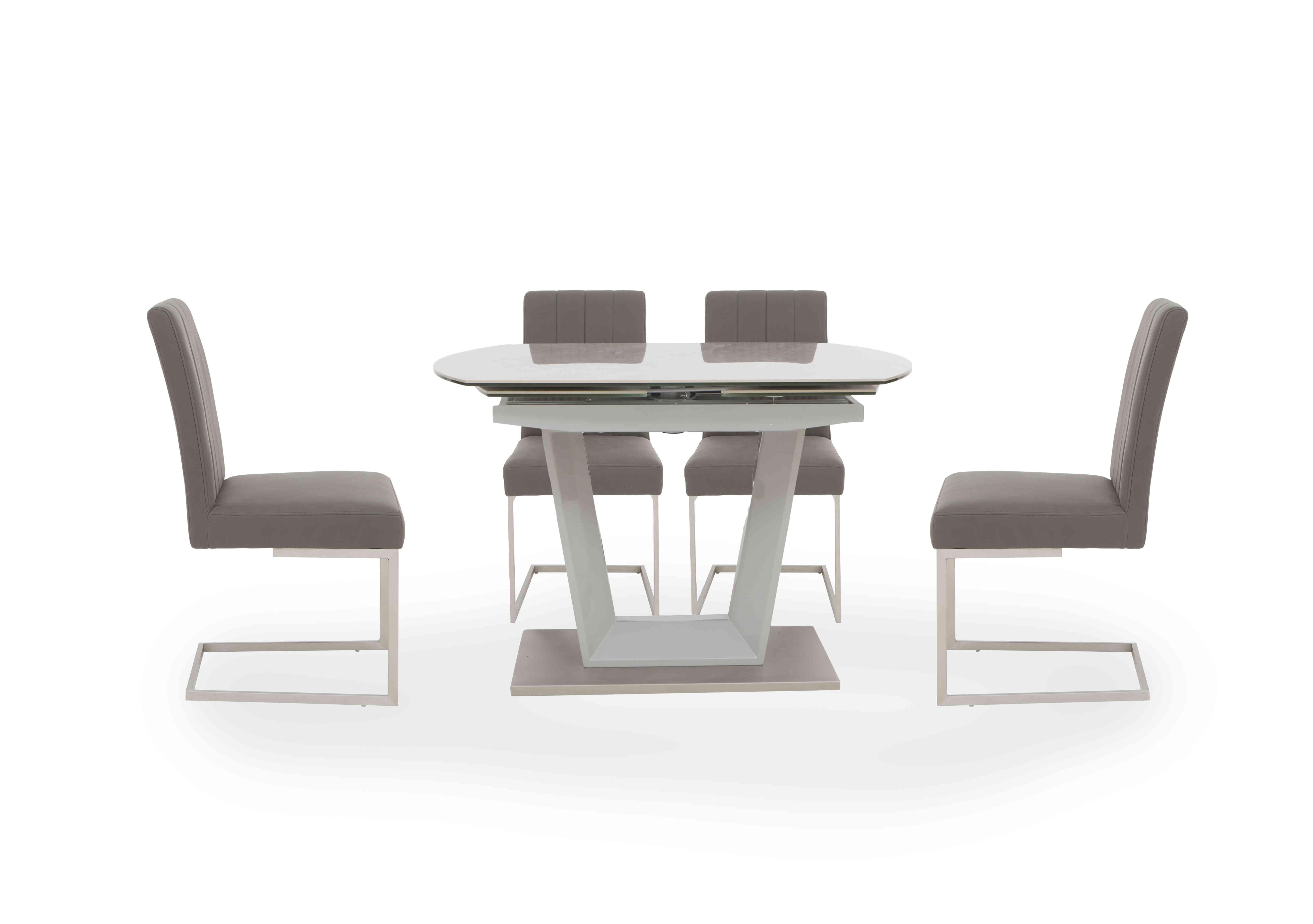 Grigio Swivel Dining Table with 4 Fixed Dining Chairs in  on Furniture Village