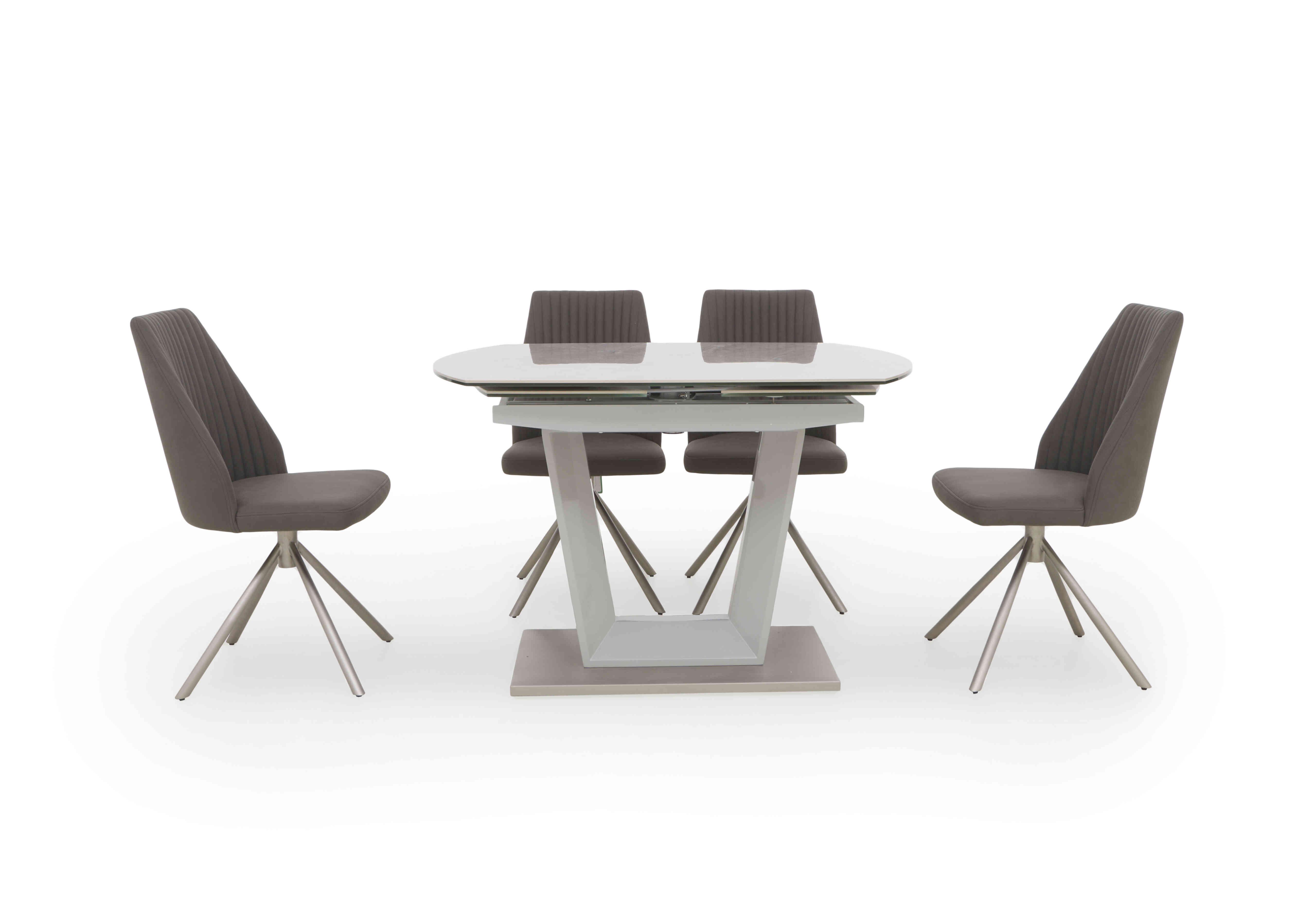 Grigio Swivel Extending Dining Table with 4 Swivel Dining Chairs in  on Furniture Village