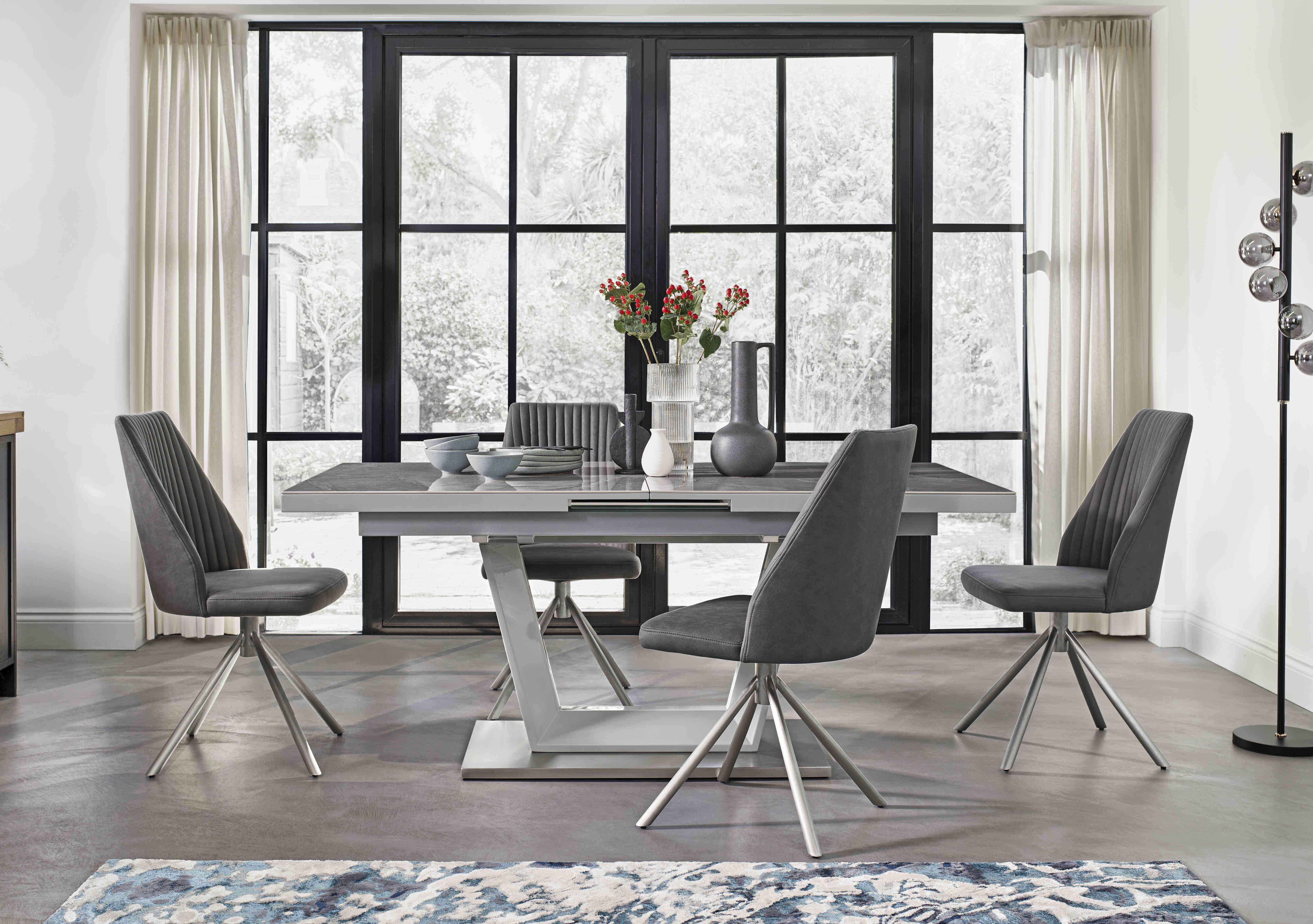 Grigio Large Extending Table with 4 Swivel Dining Chairs in  on Furniture Village