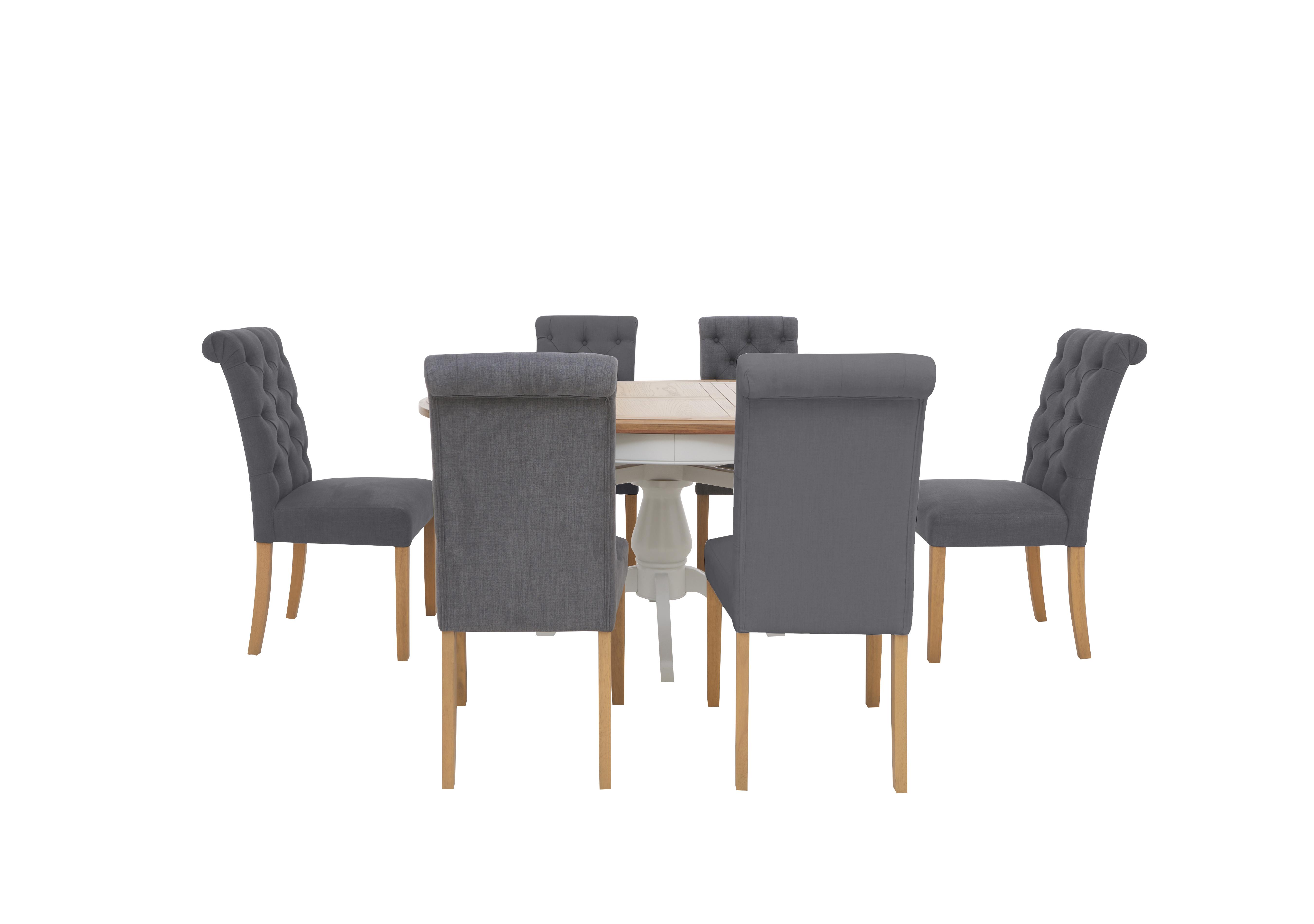Hamilton Round Extending Dining Table and 6 Fabric Dining Chairs in  on Furniture Village
