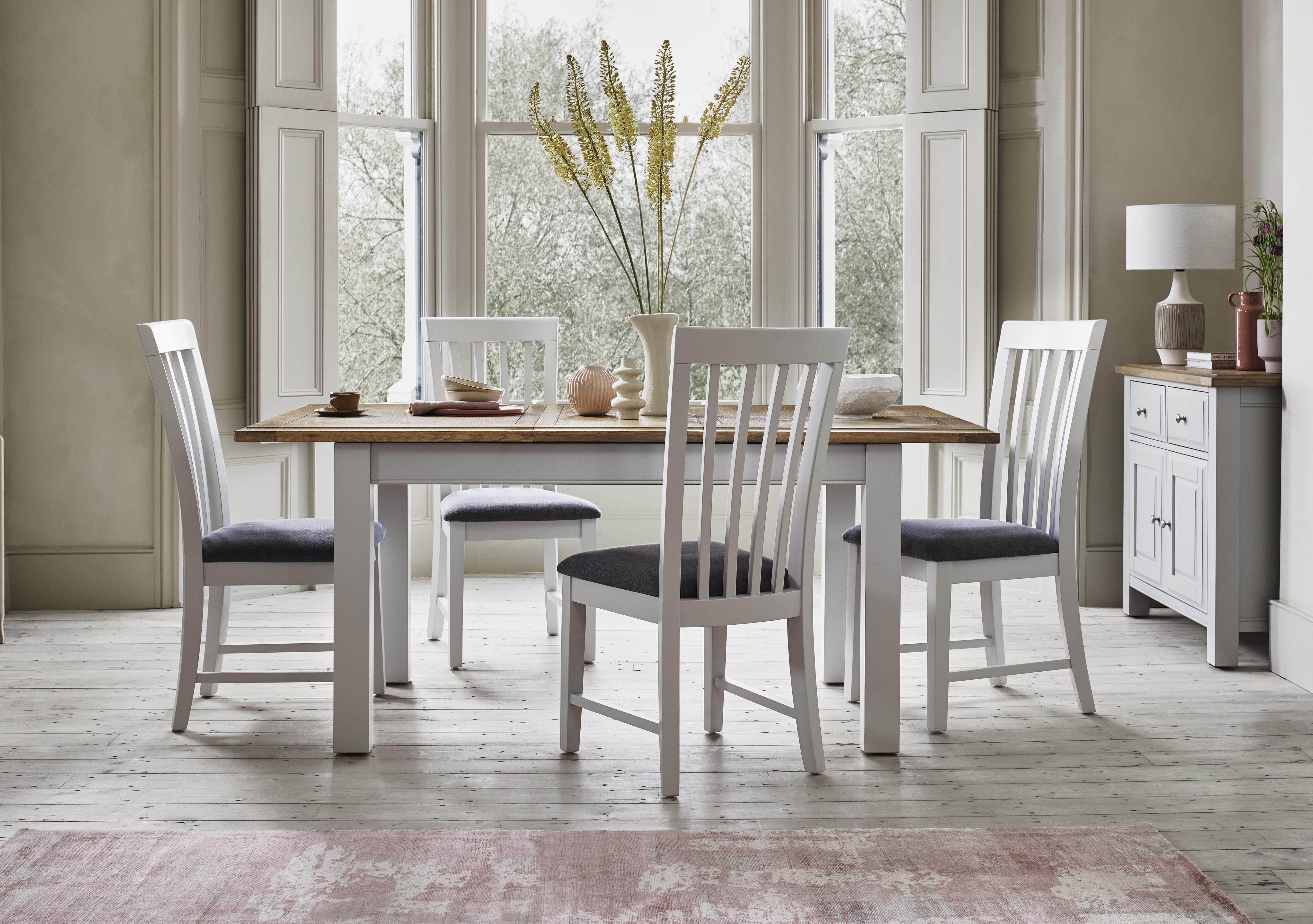 Hamilton Rectangular Extending Dining Table and 4 Wooden Dining Chairs in  on Furniture Village