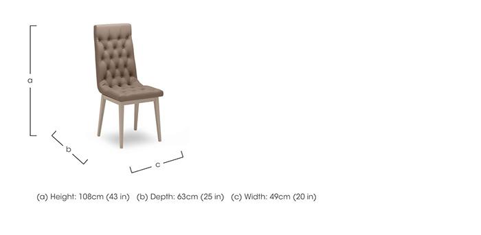 Lusso Buttoned Faux Leather Dining Chair in  on Furniture Village