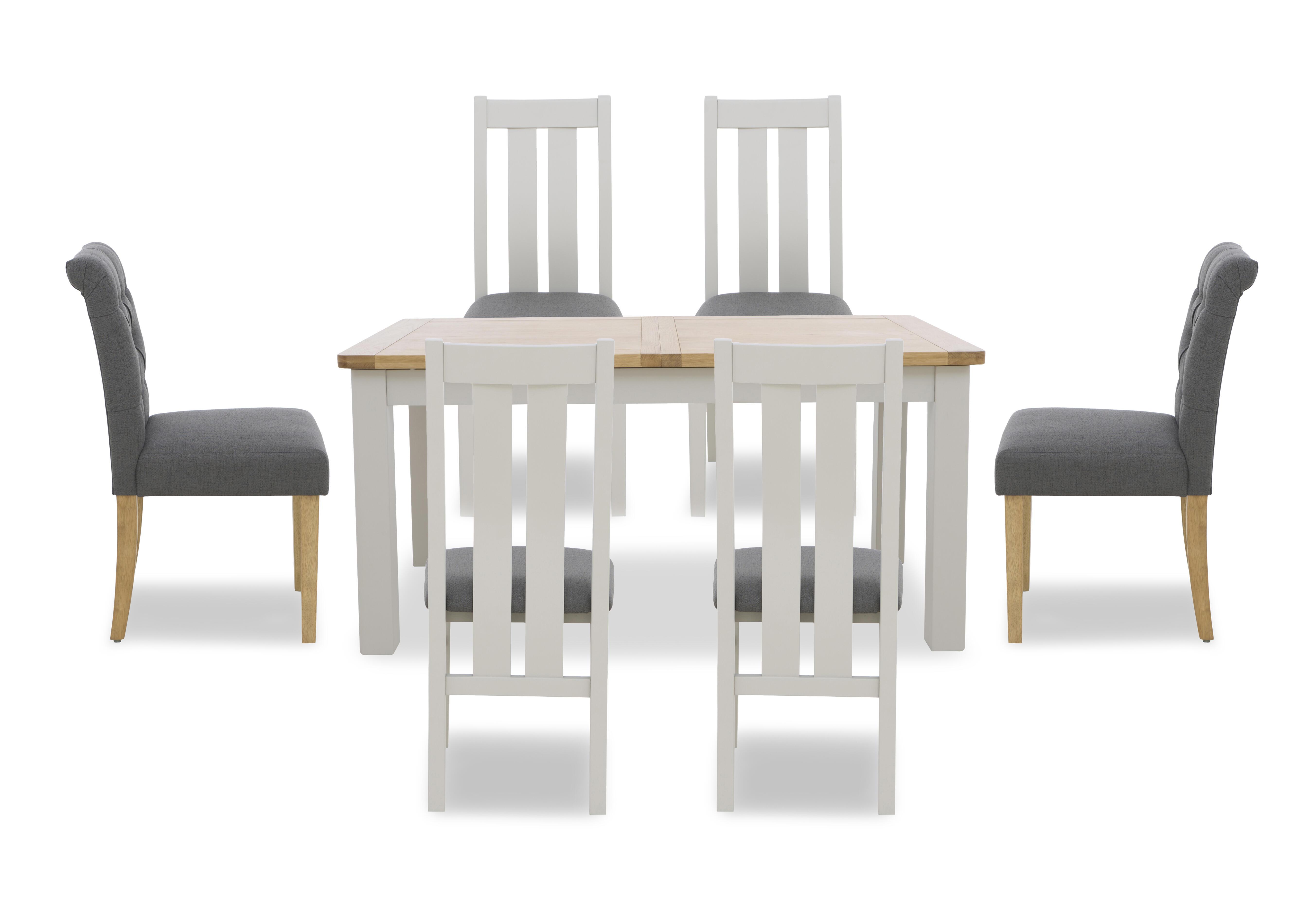 Lewis Rectangular Extending Dining Table and 4 Wooden Slatted Back Dining Chairs and 2 Button Back Dining Chairs in  on Furniture Village