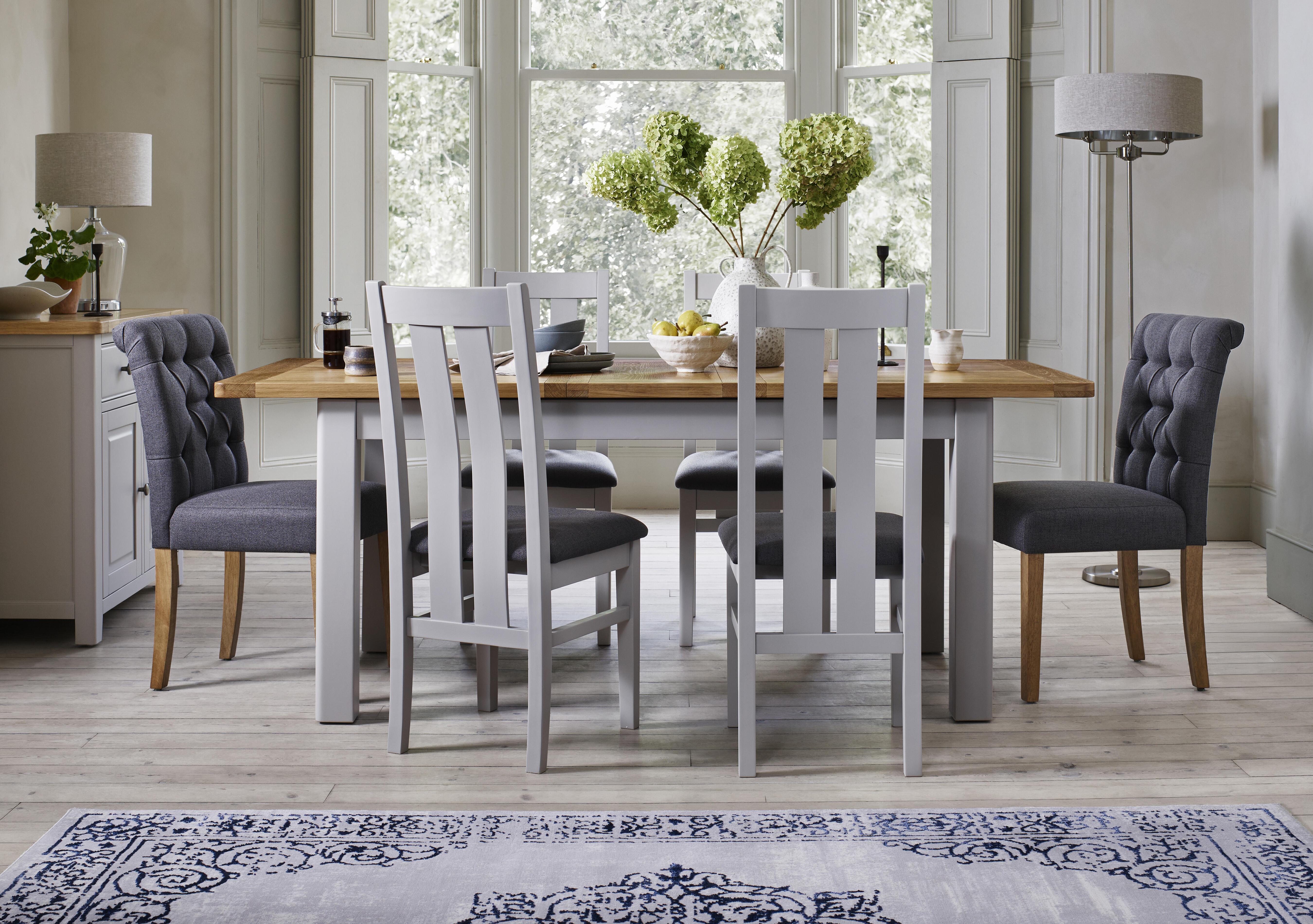 Lewis Extending Dining Table and 4 Wooden Slatted Back Dining Chairs and 2 Button Back Dining Chairs in  on Furniture Village