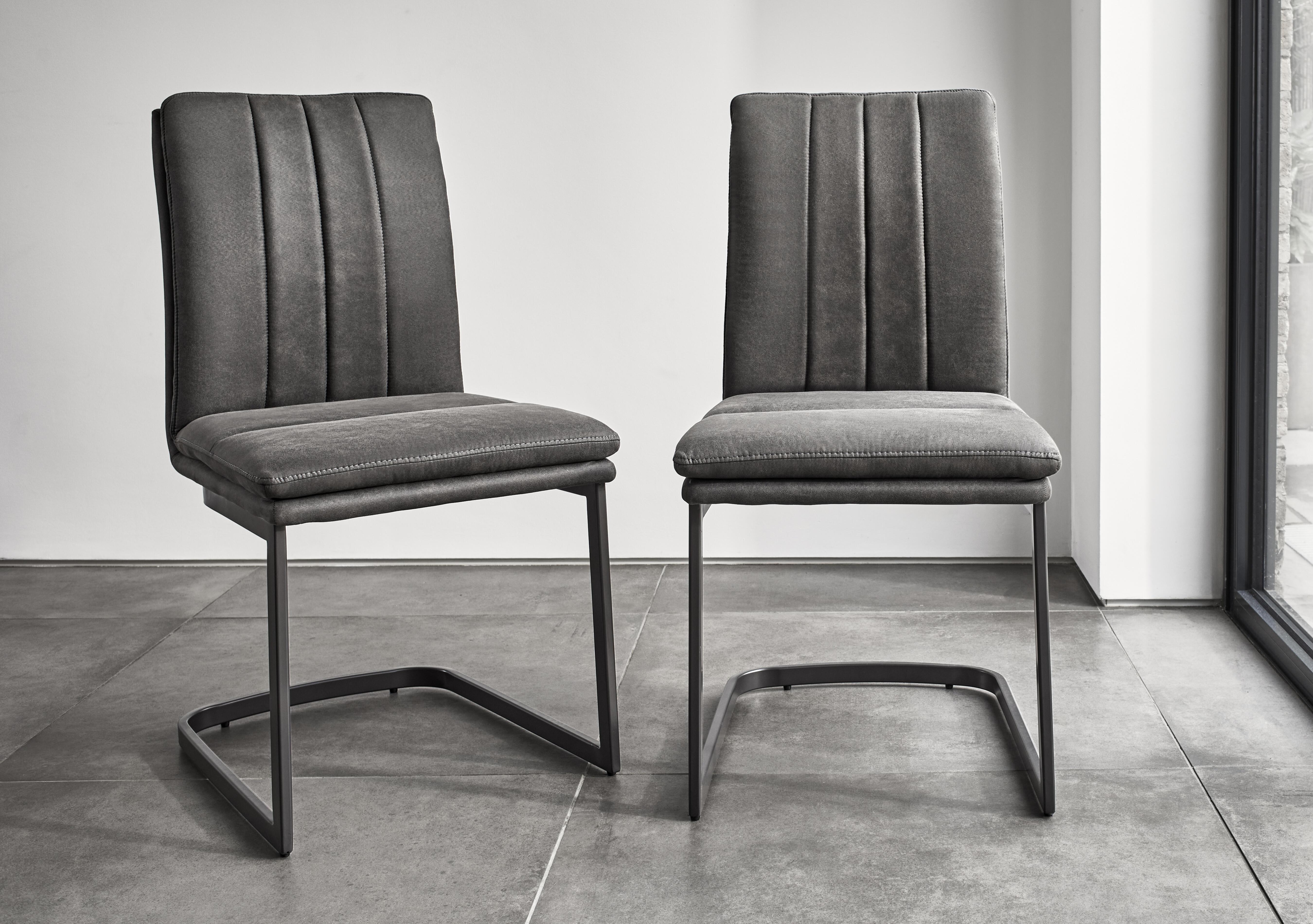 Moon Set of 4 Fabric Cantilever Dining Chairs in  on Furniture Village