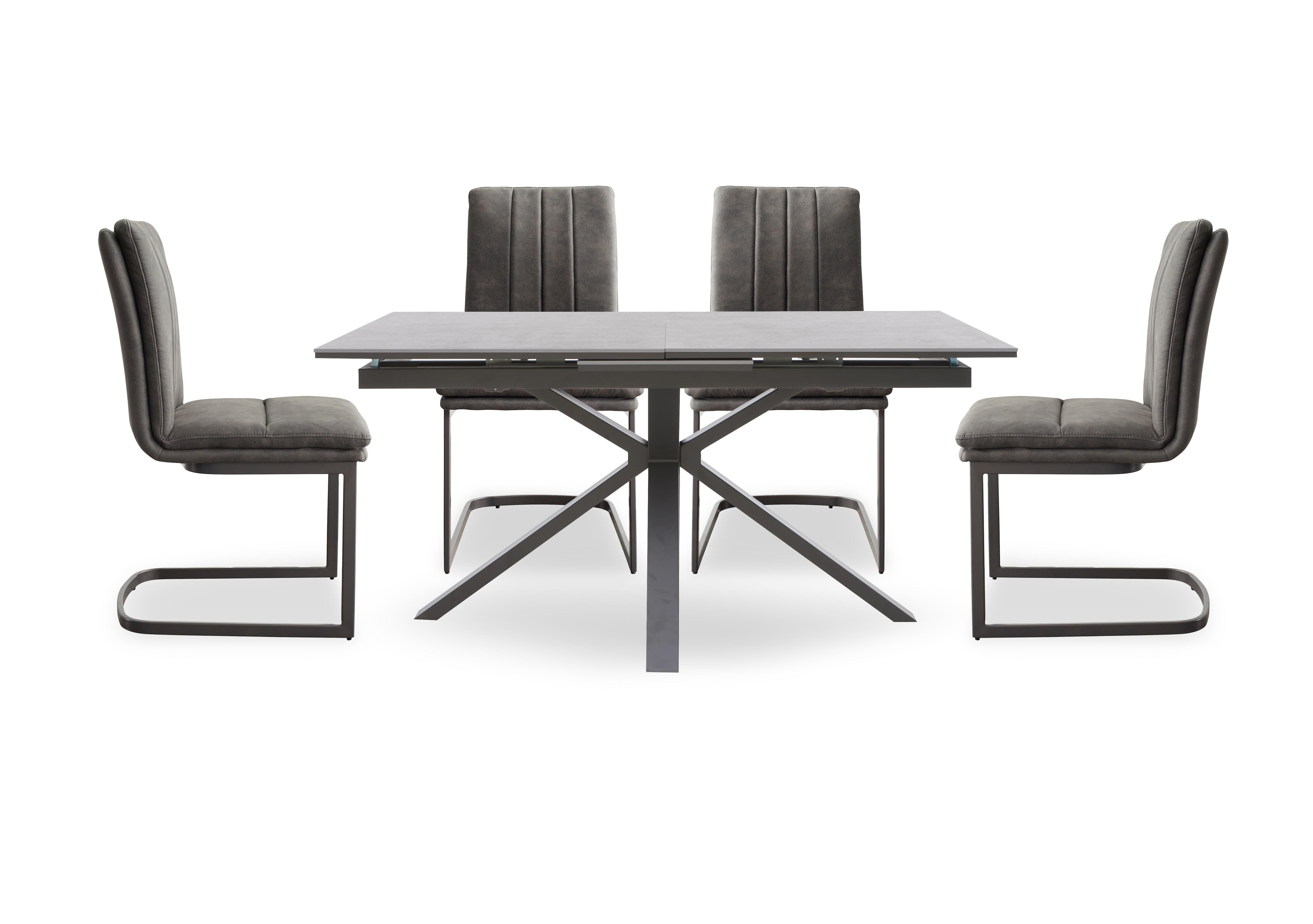 Moon Pop-up Extending Dining Table and 4 Fabric Cantilever Dining Chairs in  on Furniture Village