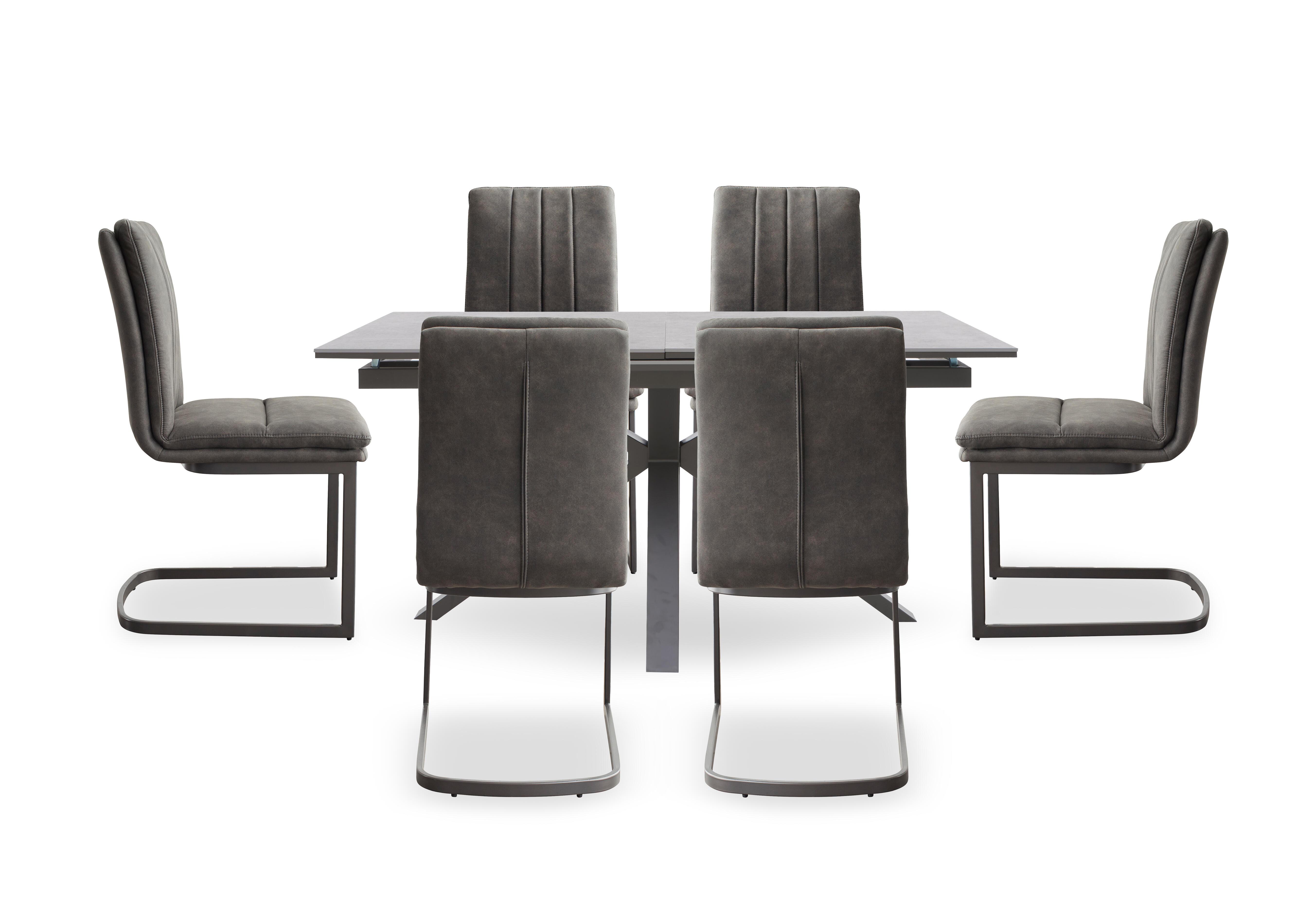 Moon Pop-up Extending Dining Table and 6 Fabric Cantilever Dining Chairs in  on Furniture Village