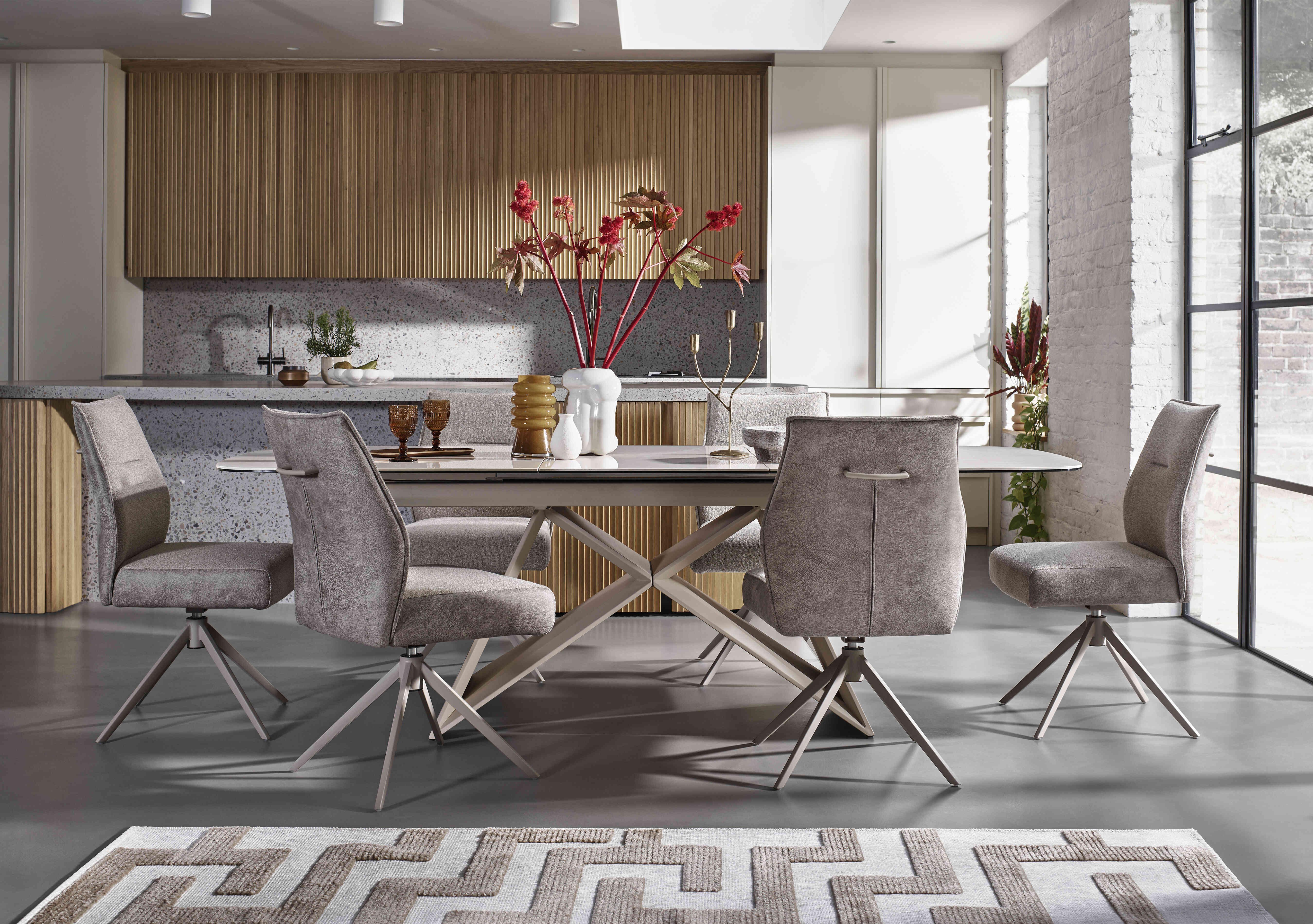 Mirage Large Extending Dining Table and 6 Swivel Dining Chairs in  on Furniture Village