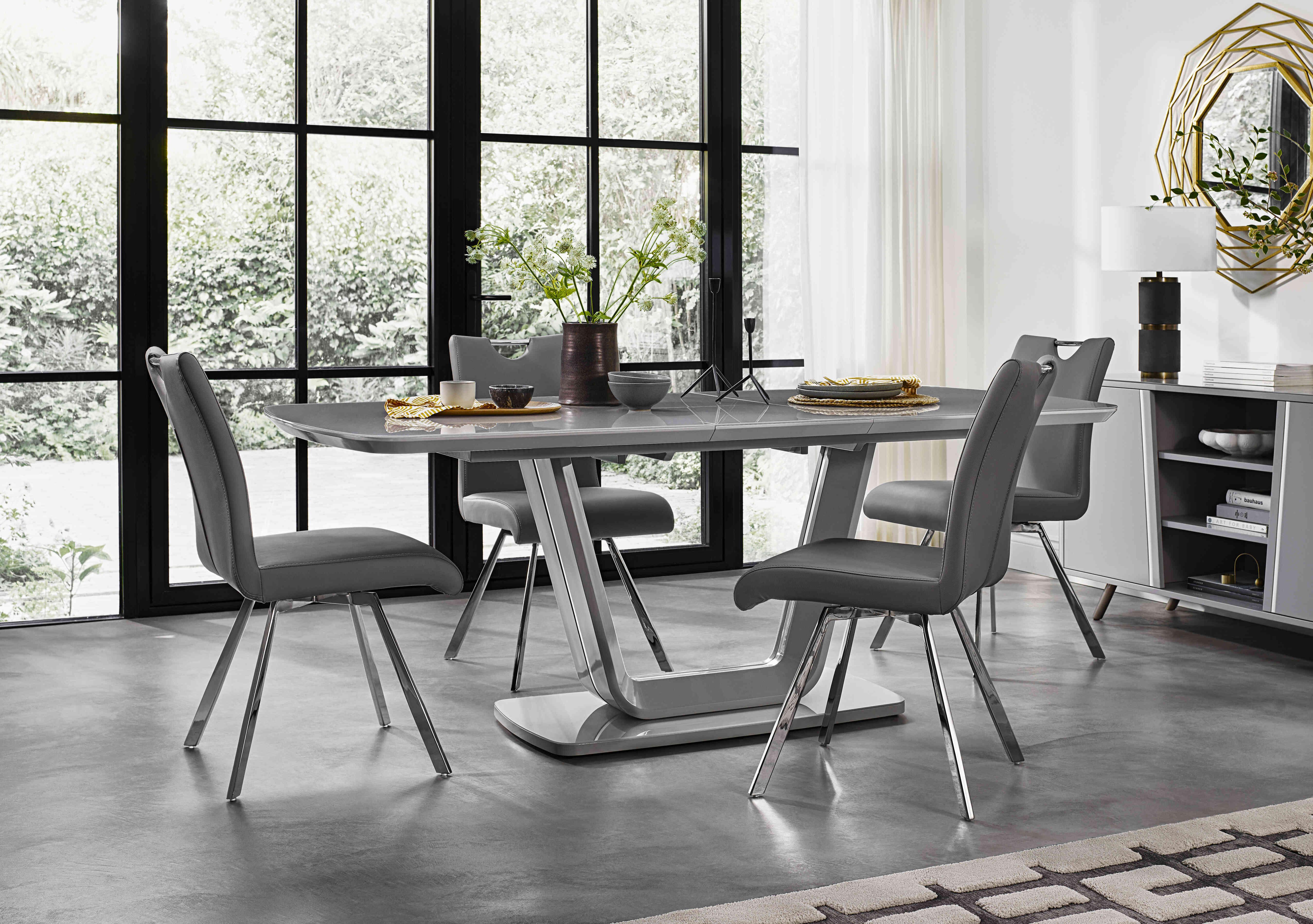 Nadal Extending Dining Table and 4 Swivel Dining Chairs in  on Furniture Village