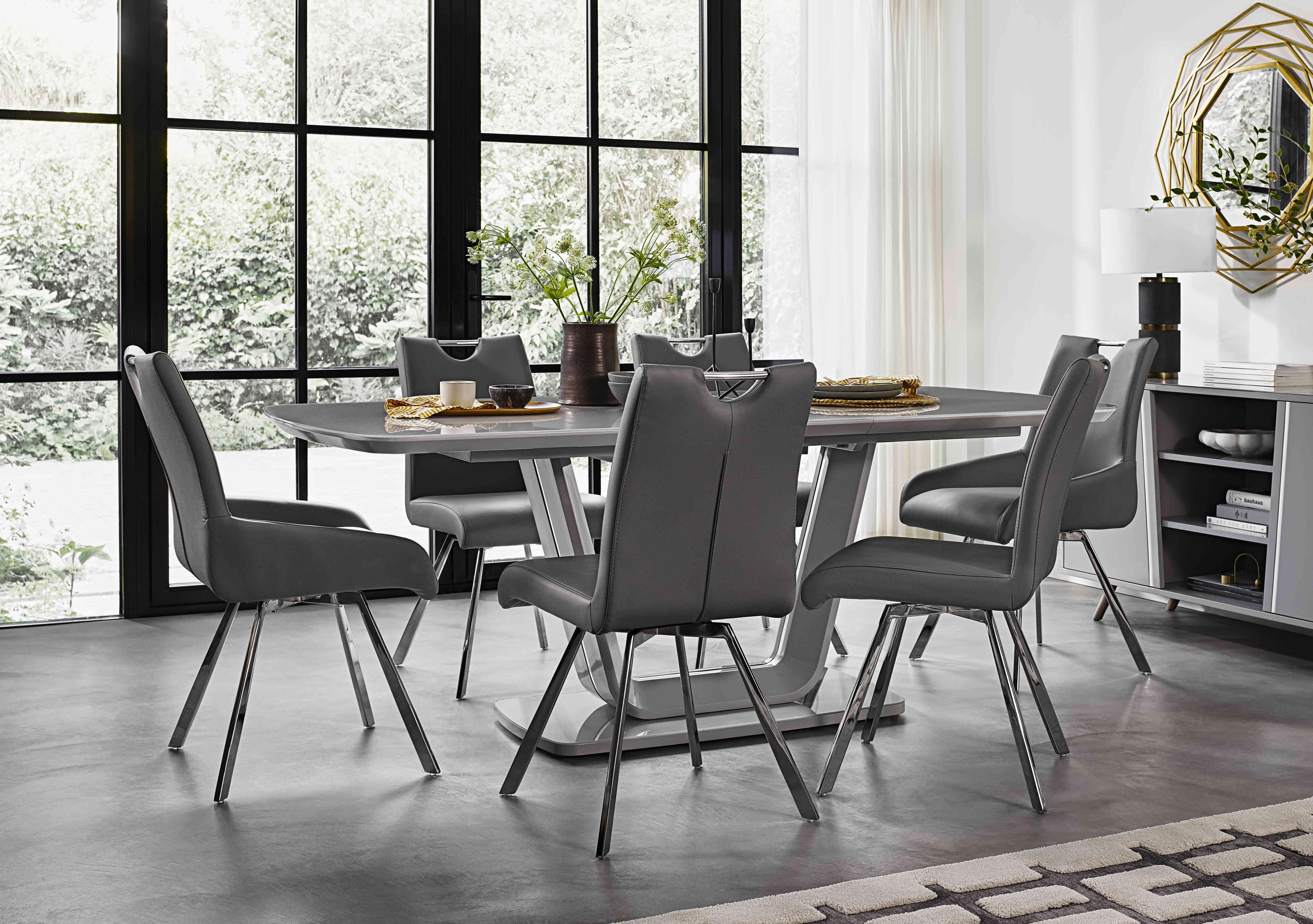 Nadal Extending Dining Table, 4 Swivel Dining Chairs and 2 Swivel Arm Dining Chairs in  on Furniture Village