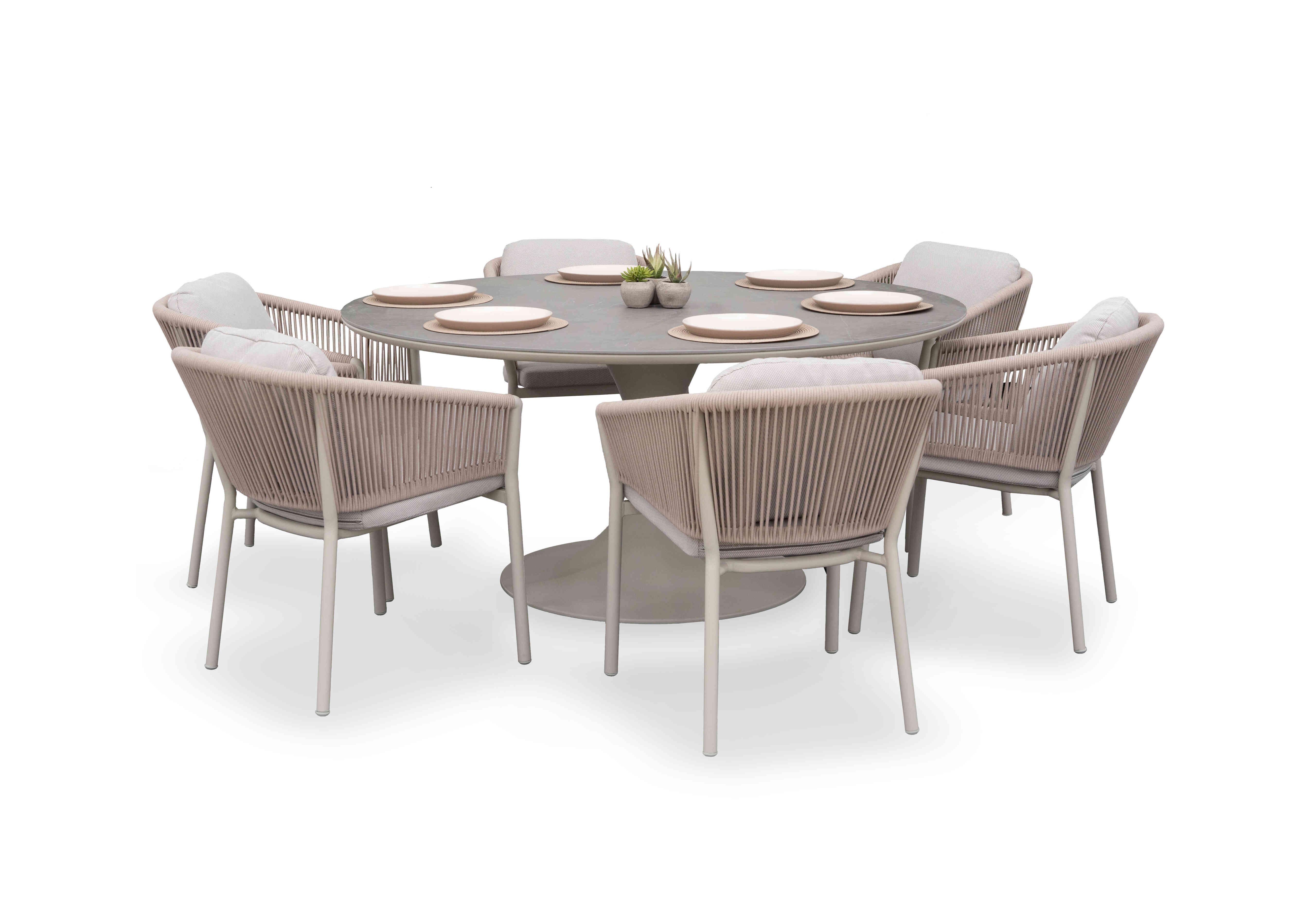 Paso Round Garden Dining Table with 6 Dining Chairs in  on Furniture Village