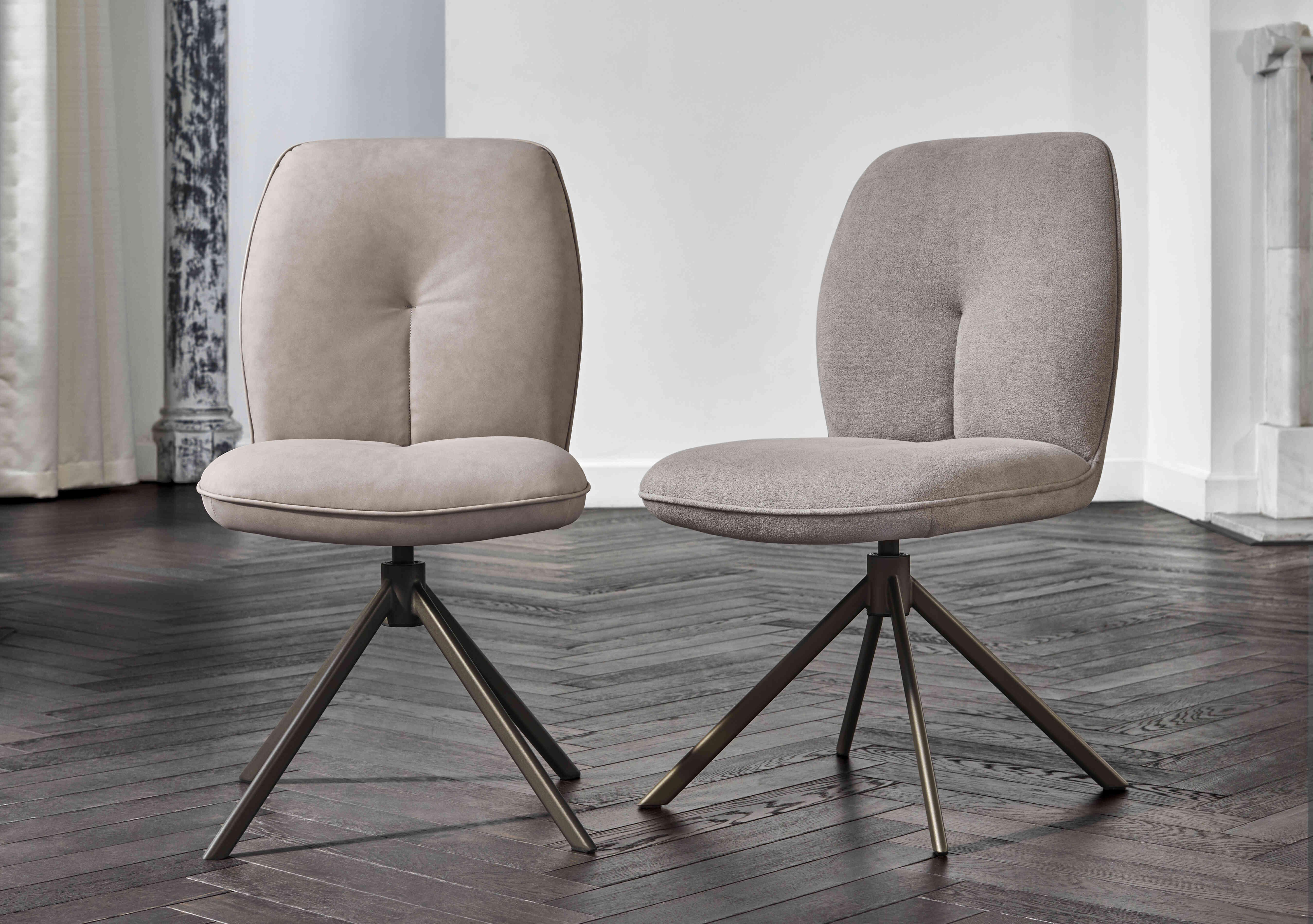 Perla Set of 4 Faux Leather Swivel Dining Chairs in  on Furniture Village