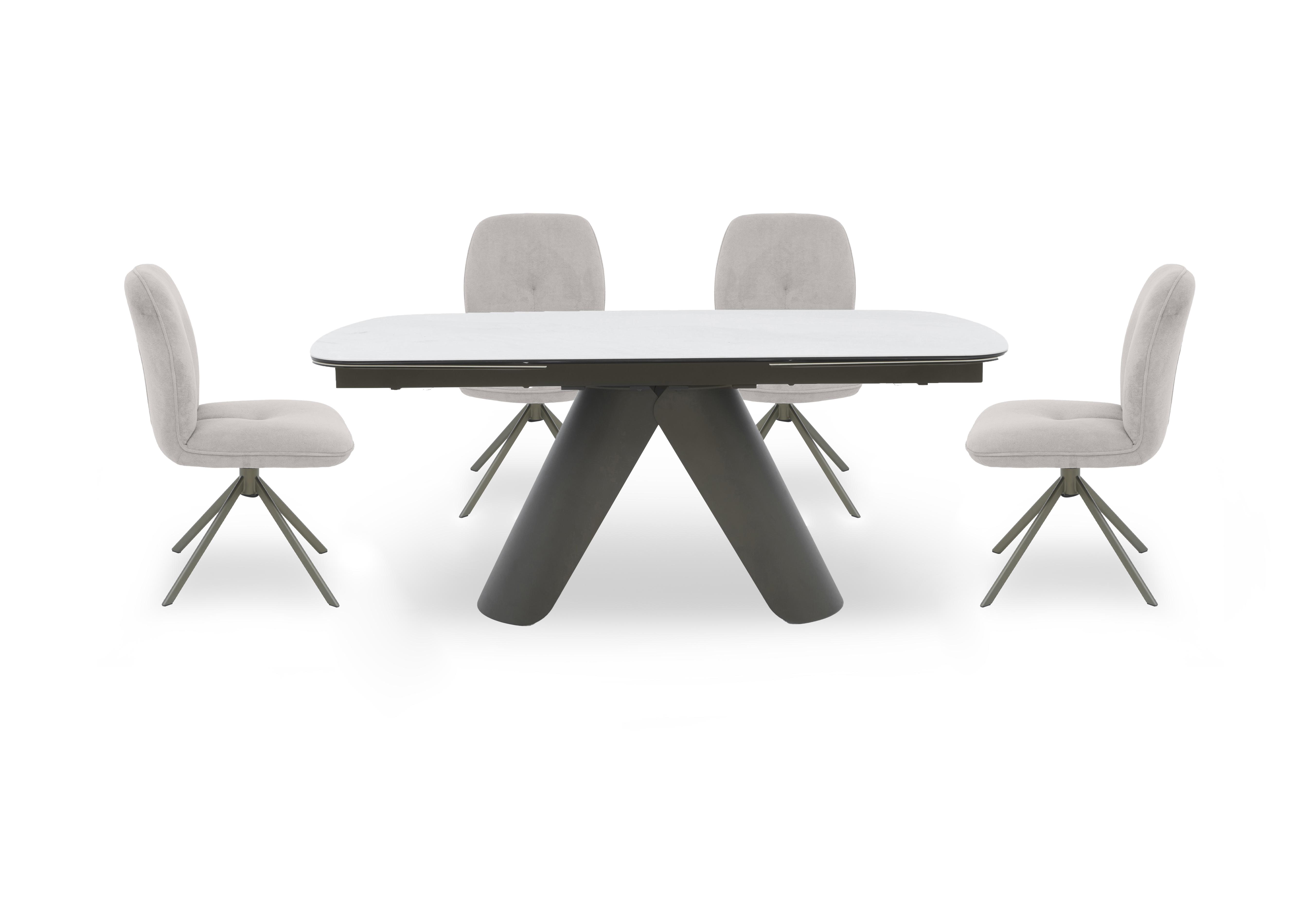 Perla Large Extending Dining Table and 4 Fabric Swivel Dining Chairs in  on Furniture Village