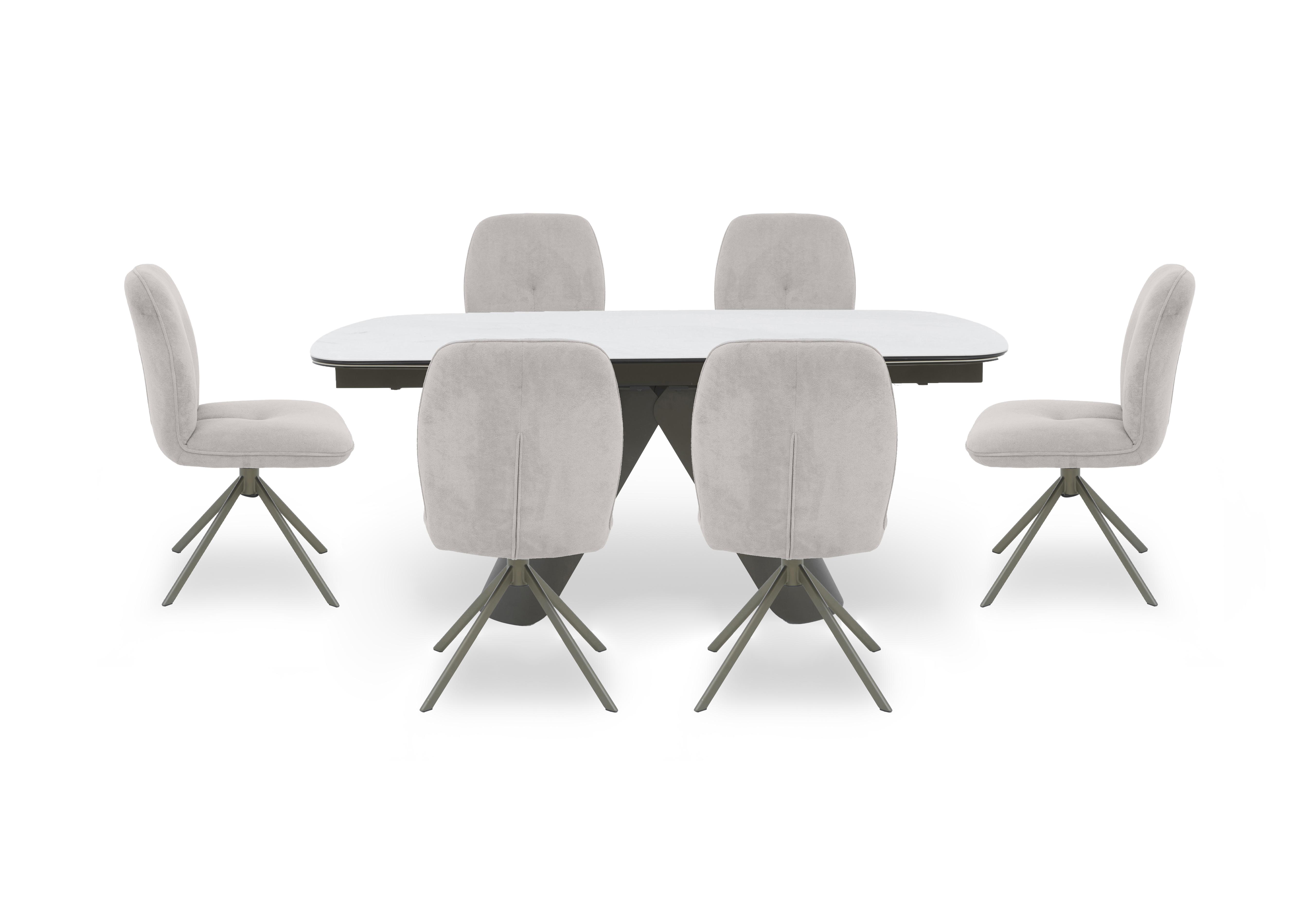 Perla Large Extending Dining Table and 6 Fabric Swivel Dining Chairs in  on Furniture Village