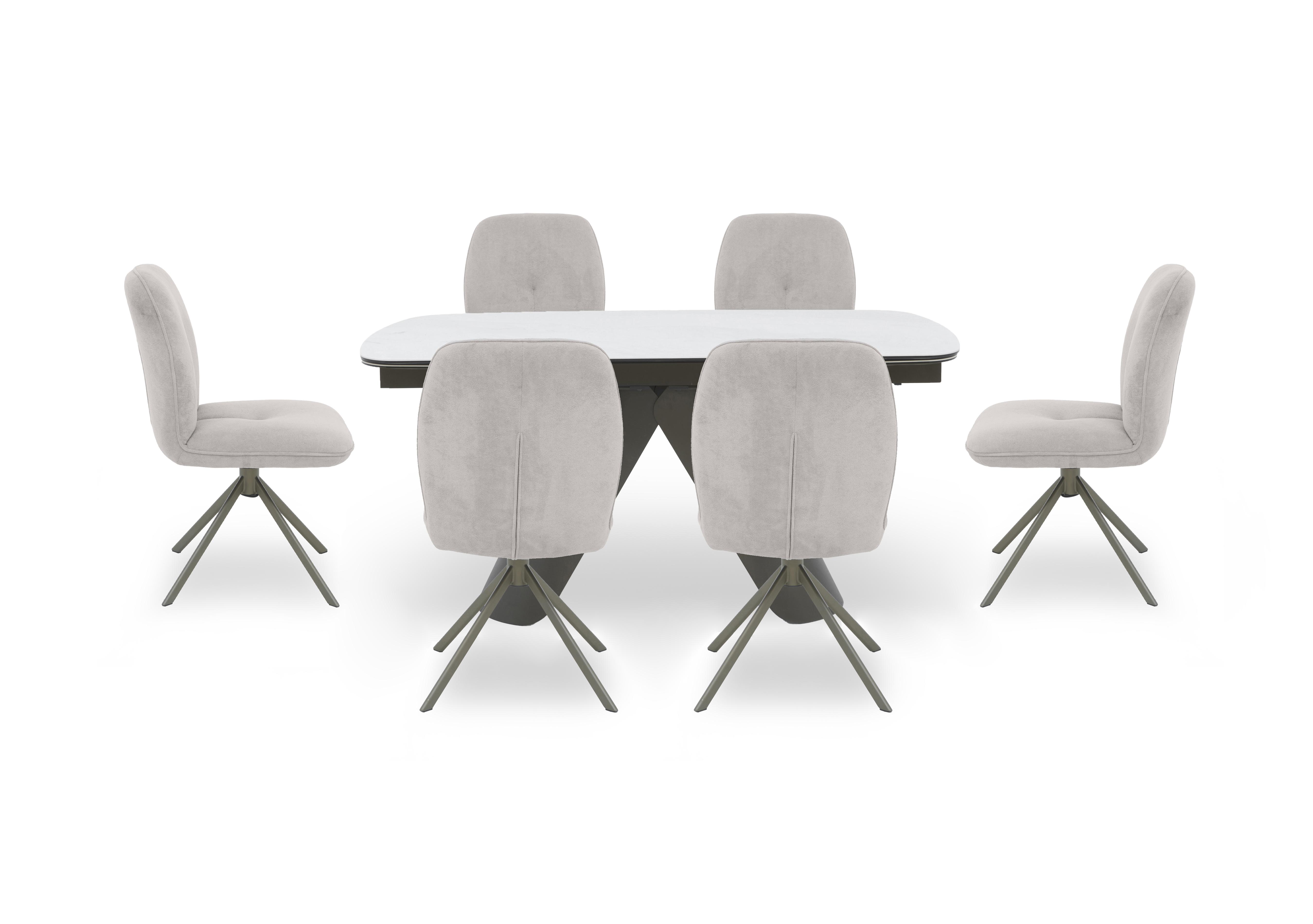 Perla Small Extending Dining Table and 6 Fabric Swivel Dining Chairs in  on Furniture Village