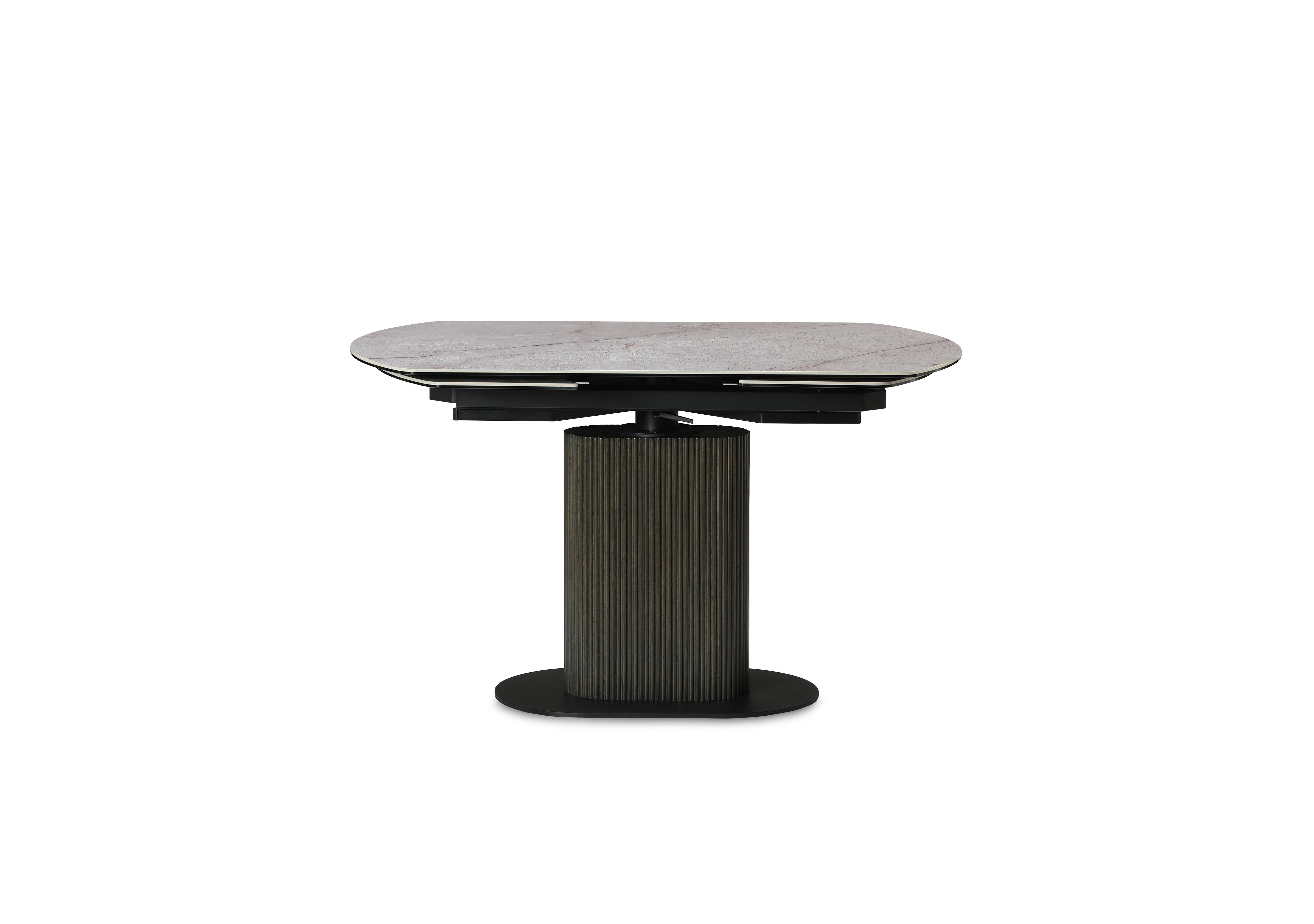 Petra Swivel Extending Dining Table in  on Furniture Village