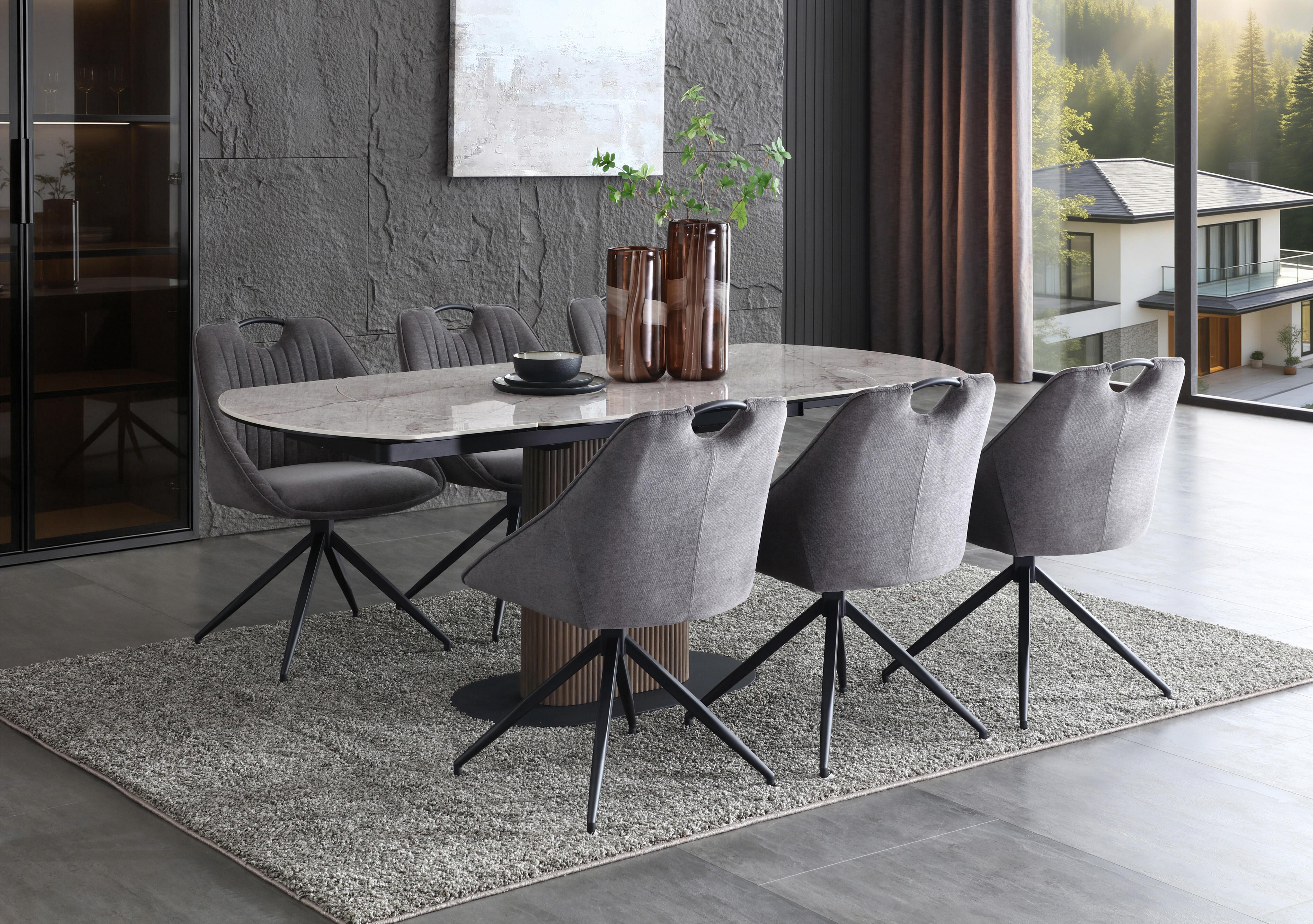Petra Swivel Extending Dining Table in  on Furniture Village