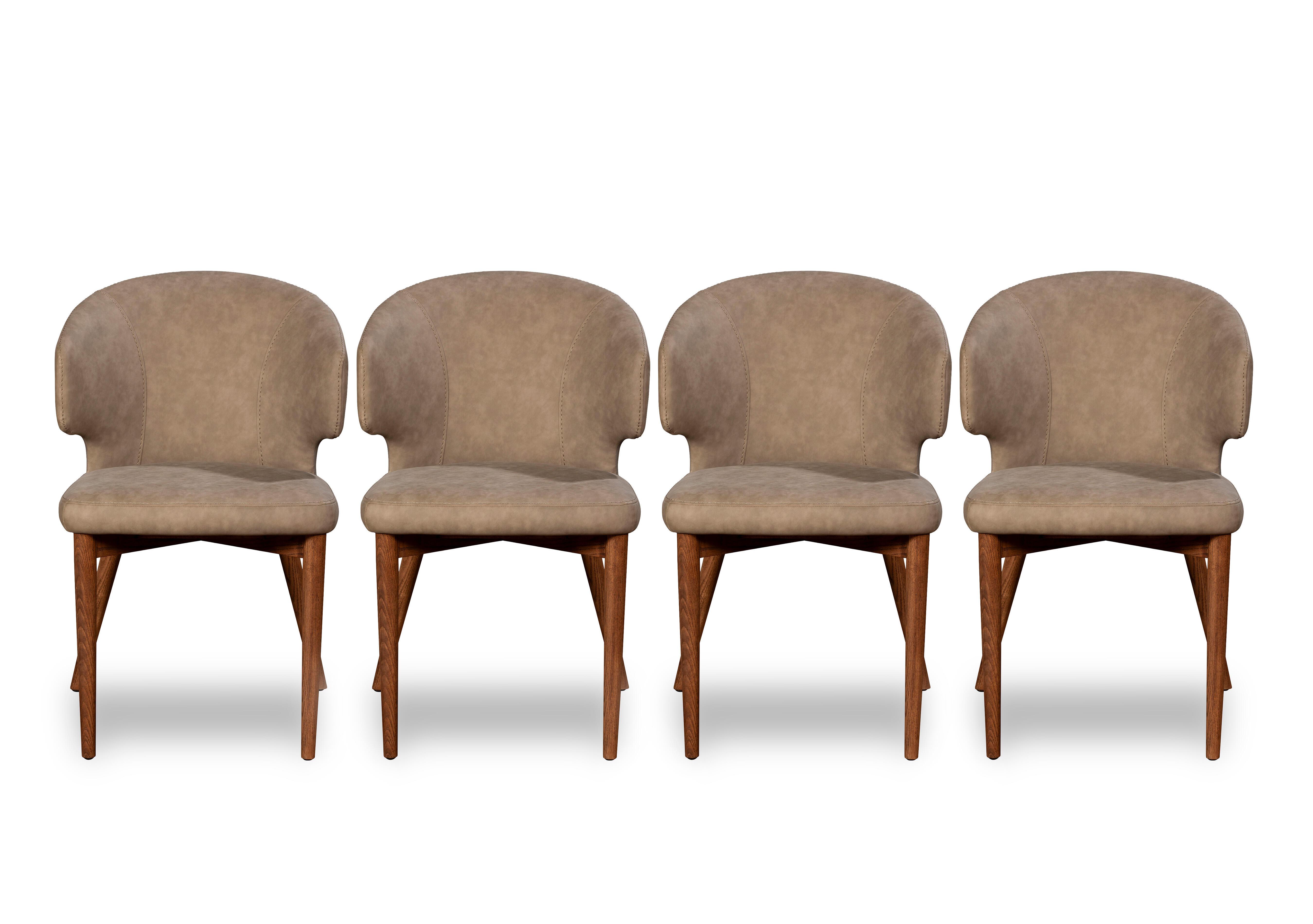Pien Set of 4 Faux Leather Dining Chairs with Wooden Legs in  on Furniture Village