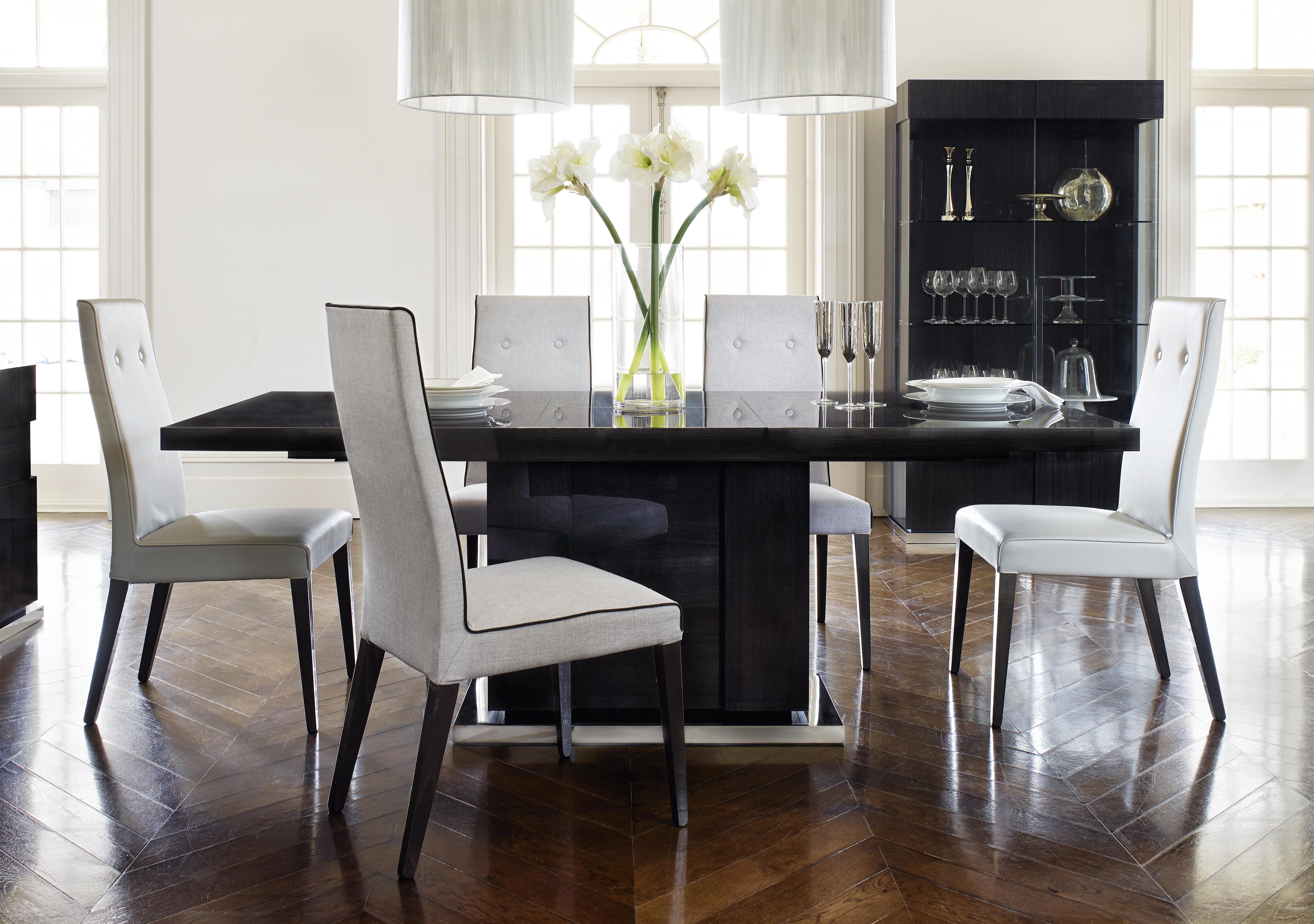 St Moritz Extending Table and 4 Faux Leather Upholstered Chairs in  on Furniture Village