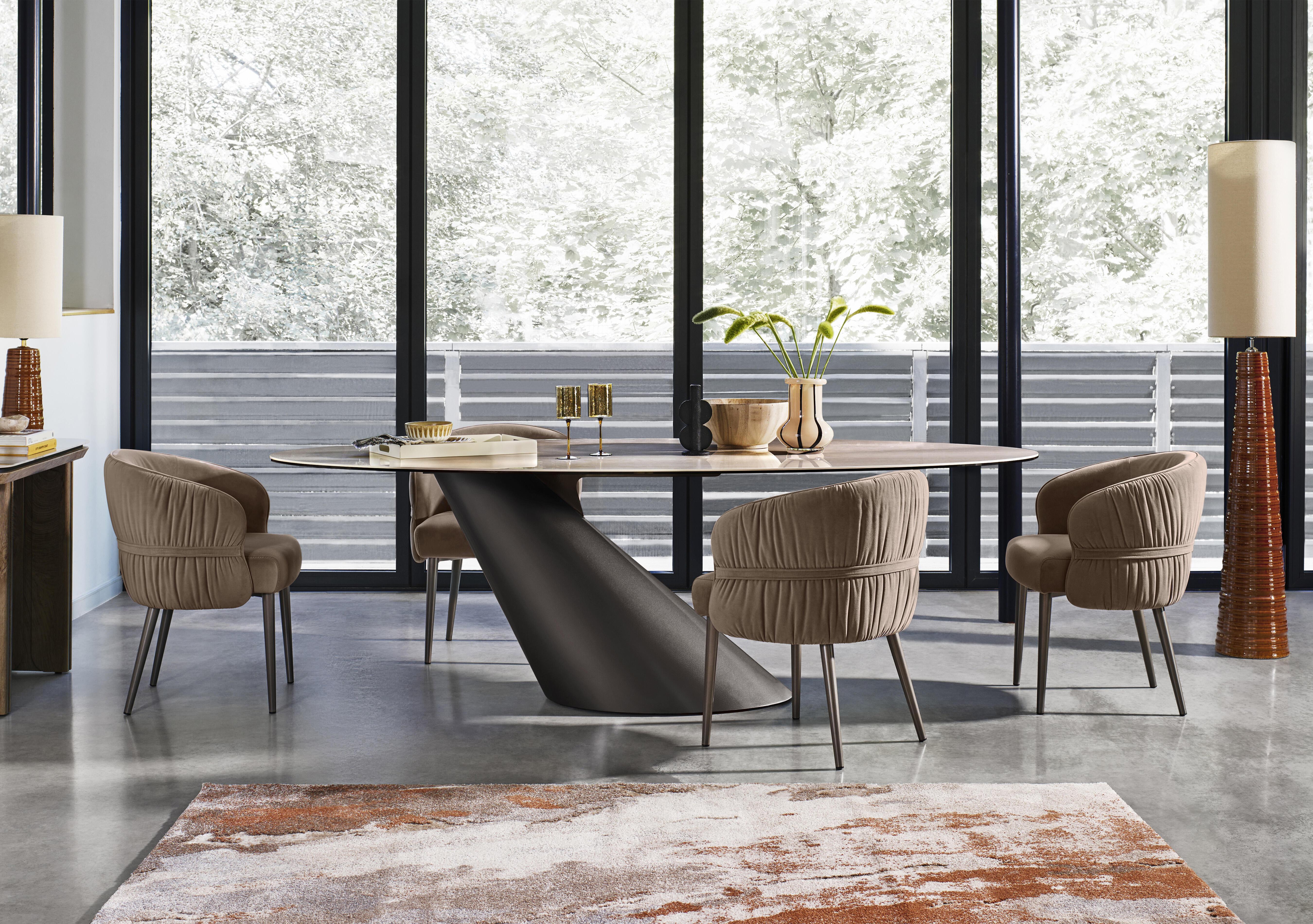 Vardy Oval Dining Table and 4 Fabric Dining Chairs in  on Furniture Village