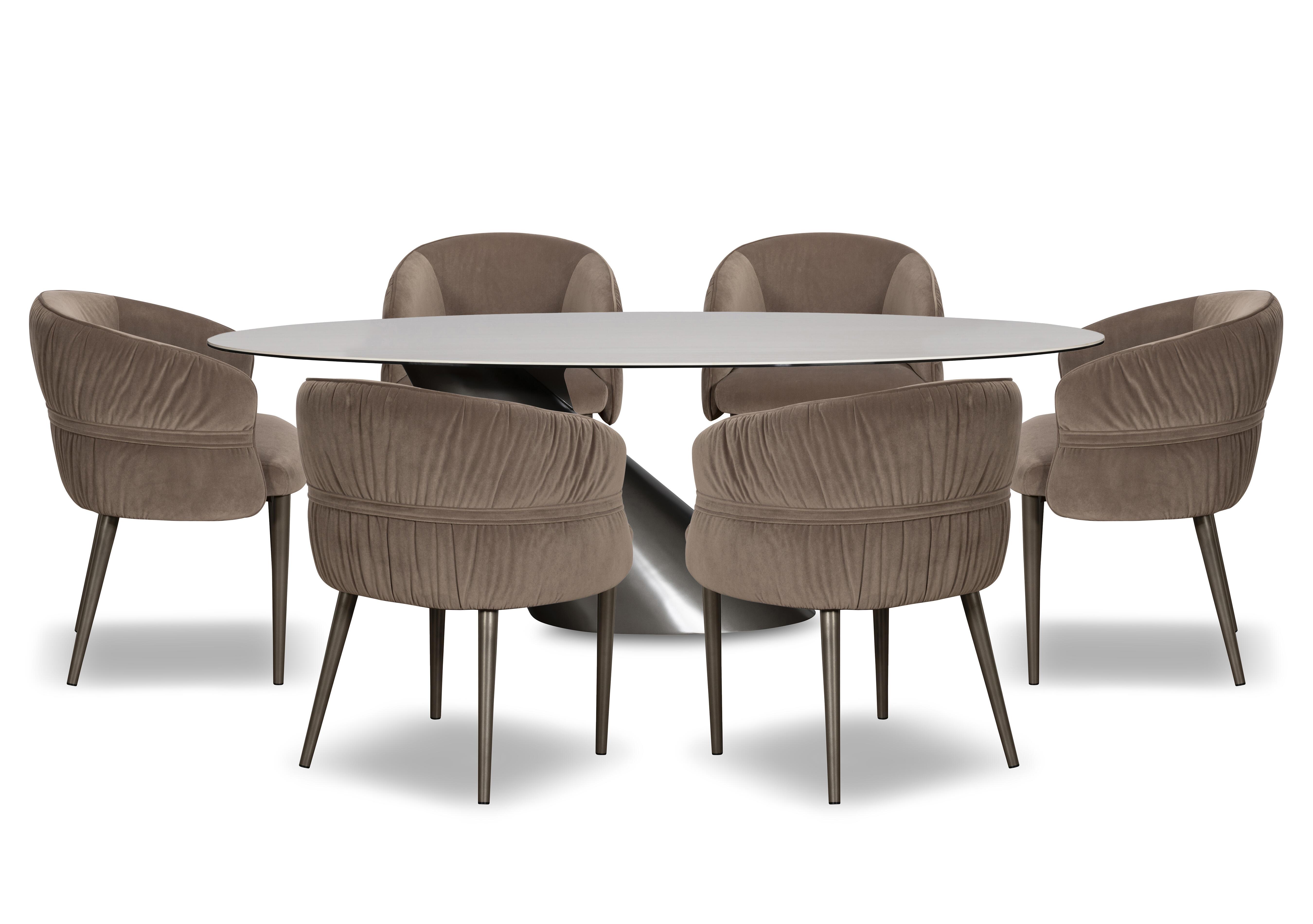 Vardy Oval Dining Table and 6 Fabric Dining Chairs in  on Furniture Village