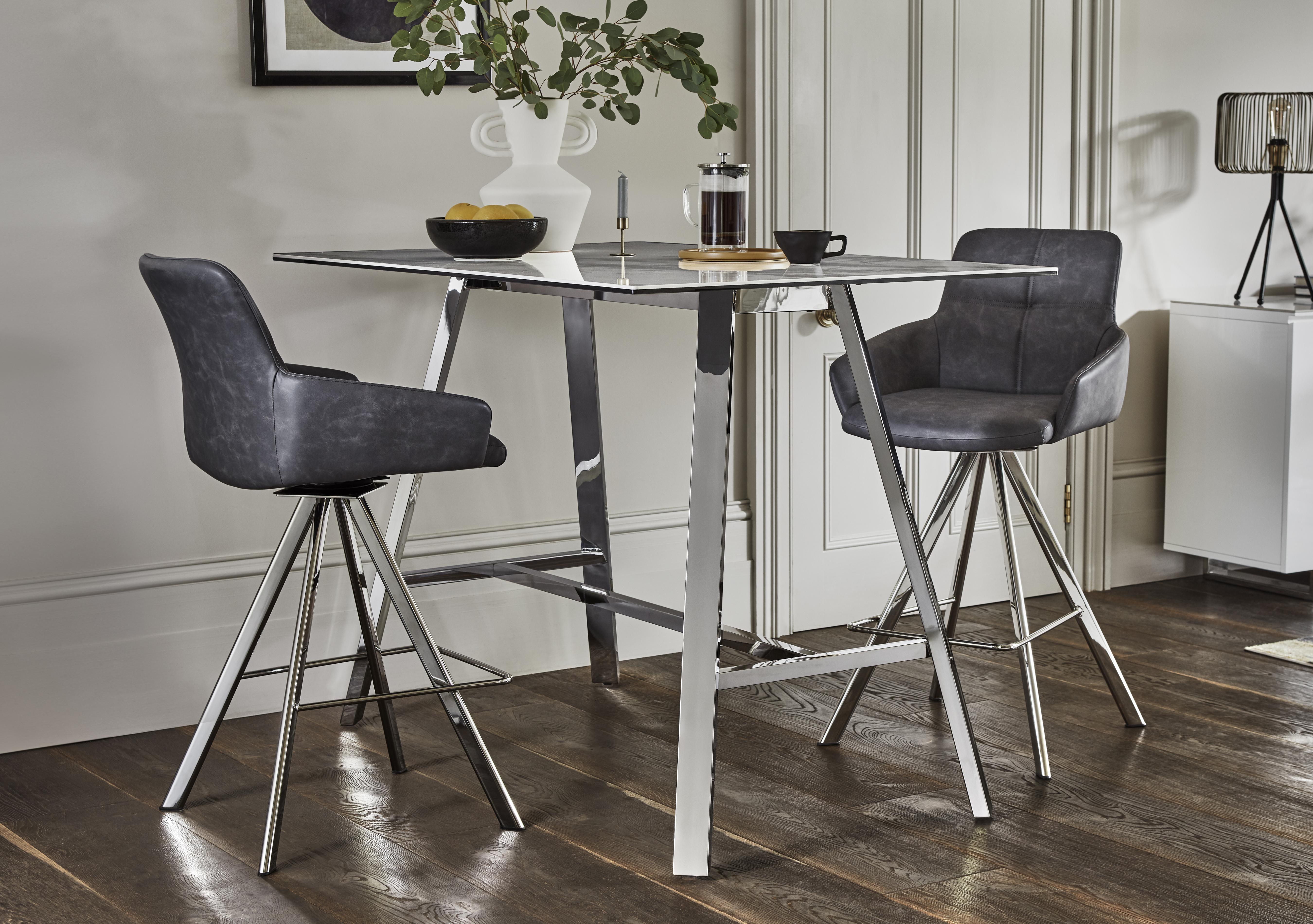 Vegas Bar Table with 2 Faux Leather Swivel Barstools with Arms in  on Furniture Village