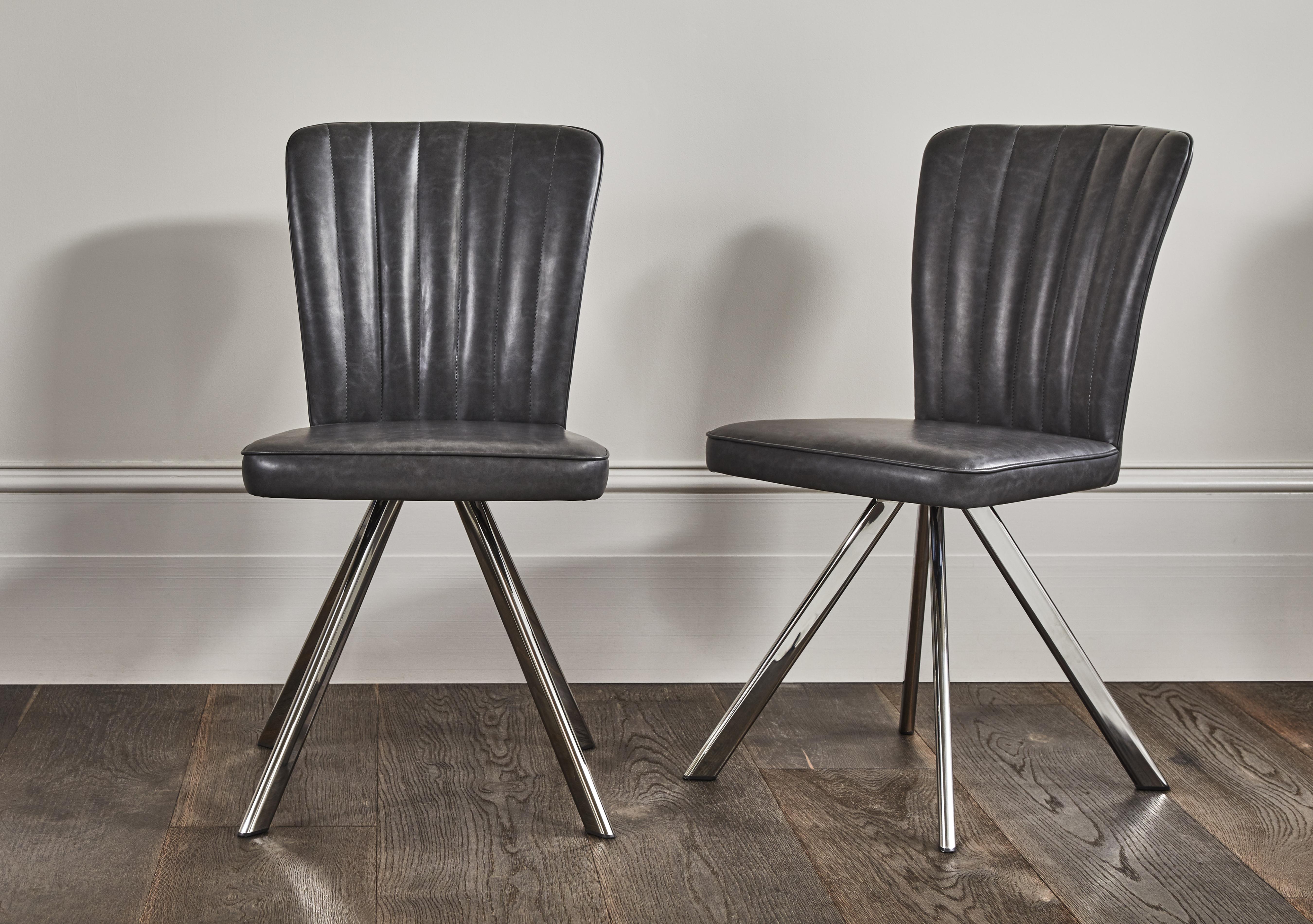 Vegas Pair of Faux Leather Swivel Dining Chairs in  on Furniture Village