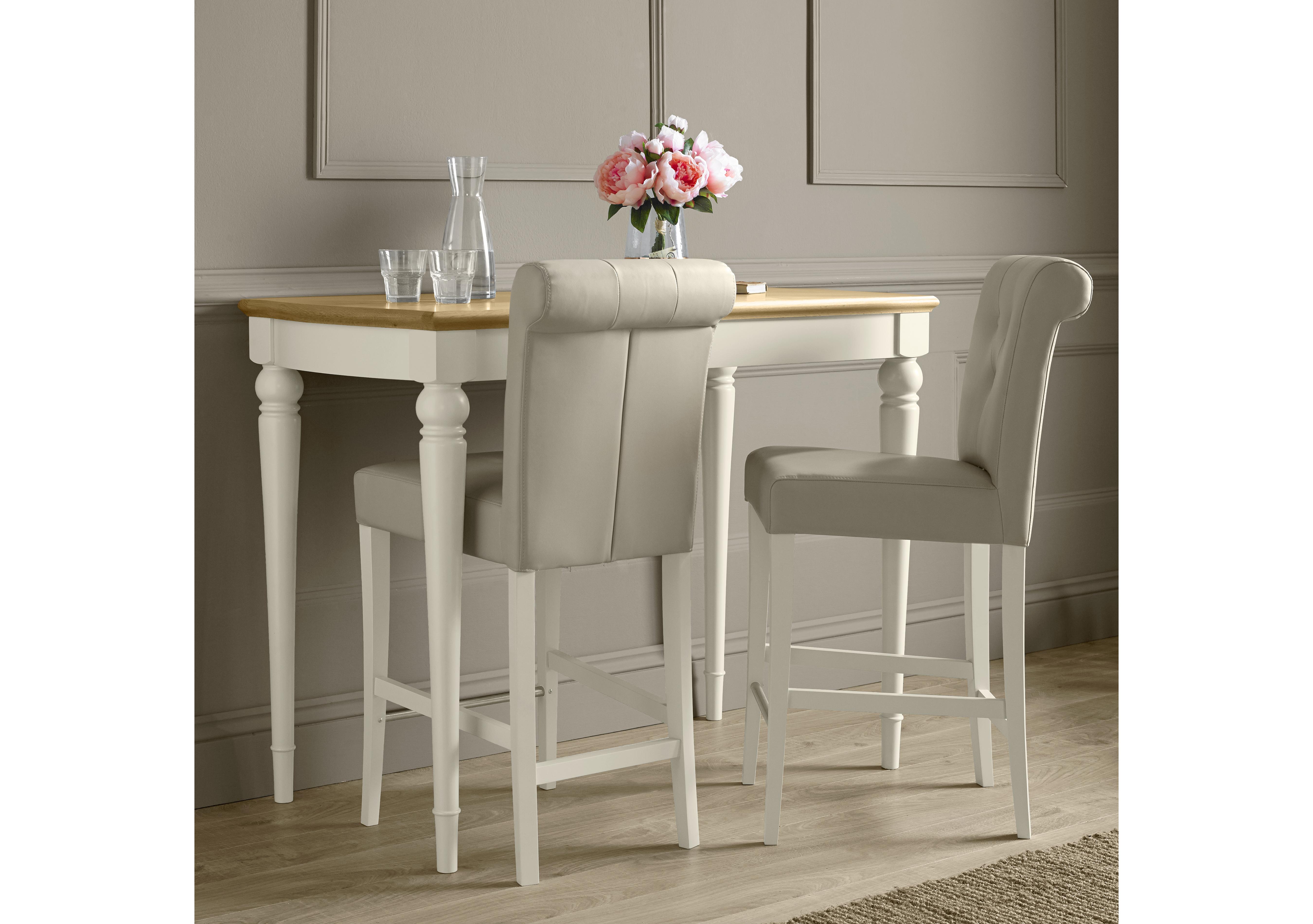 Annecy Bar Table with 2 Faux Leather Roll Back Bar Stools in  on Furniture Village