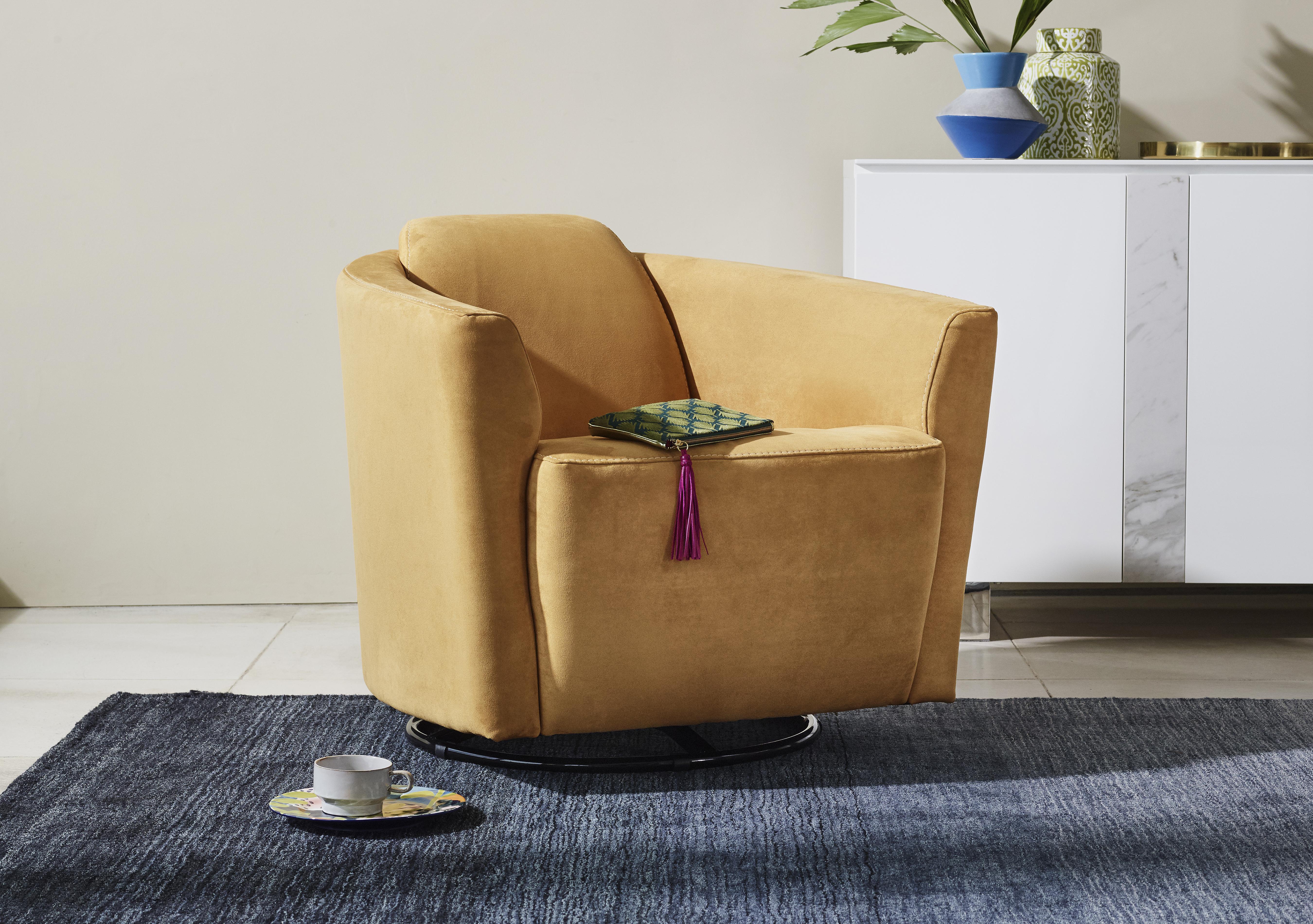 Ketty Fabric Swivel Chair in  on Furniture Village