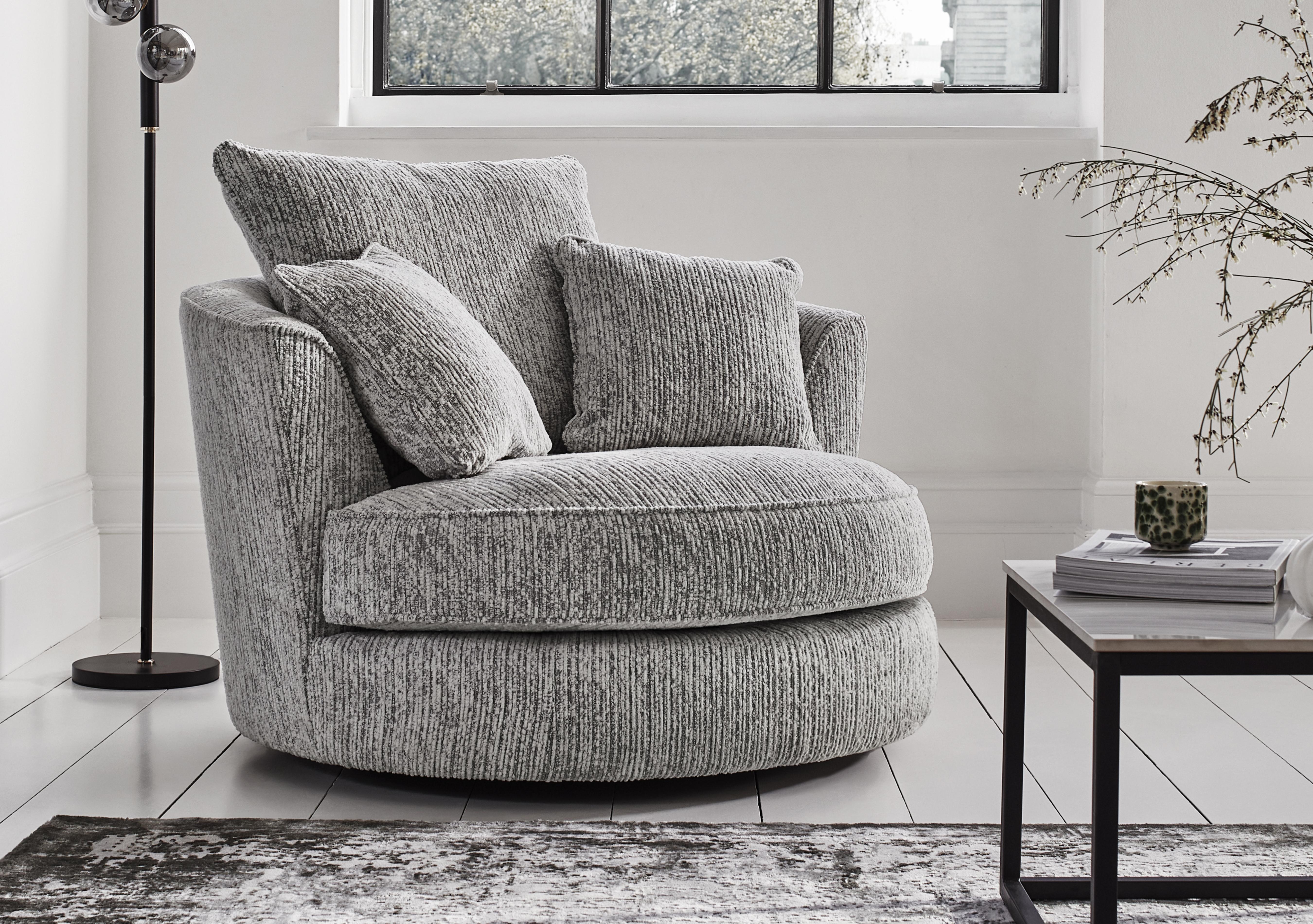 Legend Fabric Swivel Chair in  on Furniture Village