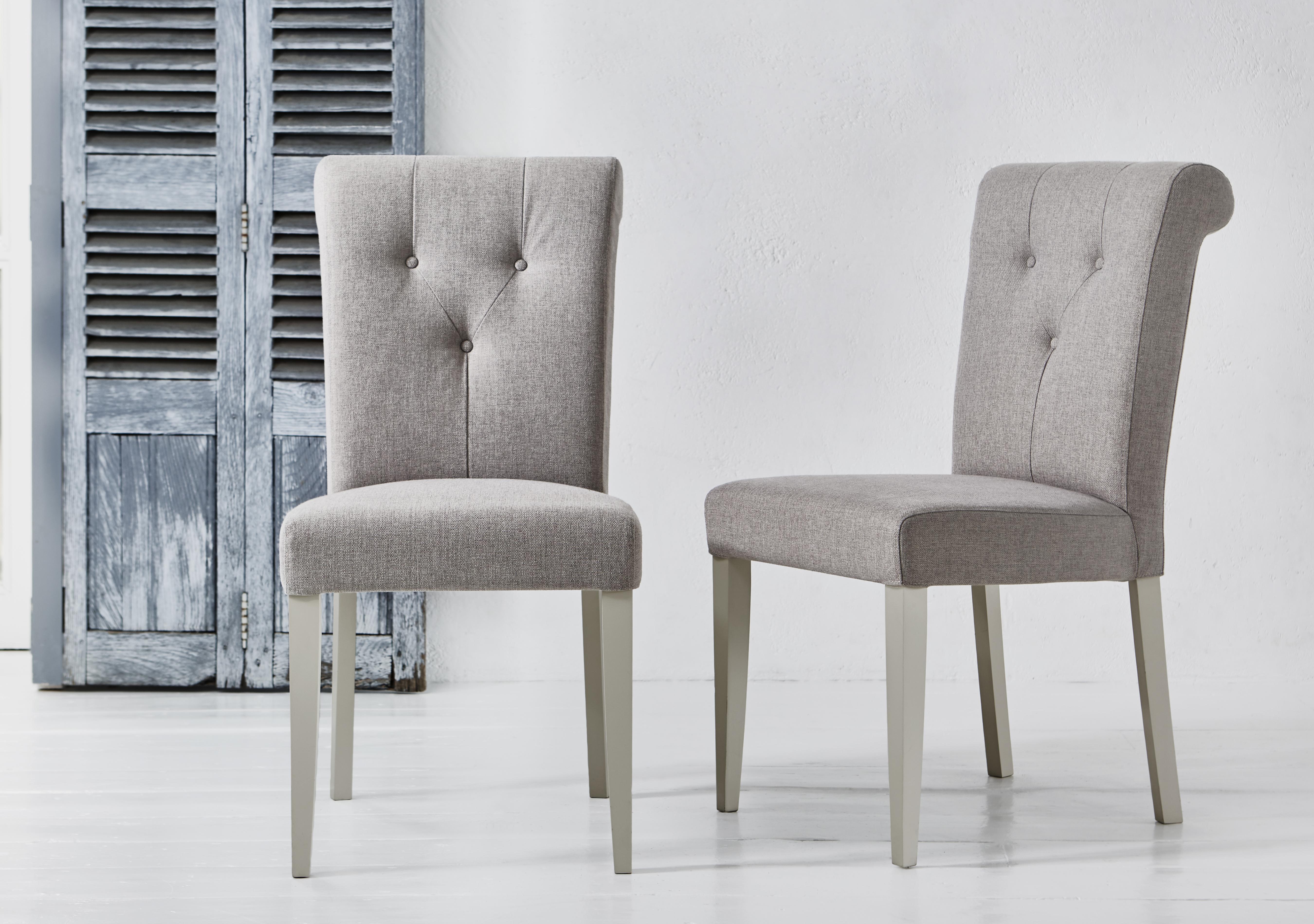 Annecy Pair of Upholstered Fabric Roll Back Dining Chairs in  on Furniture Village