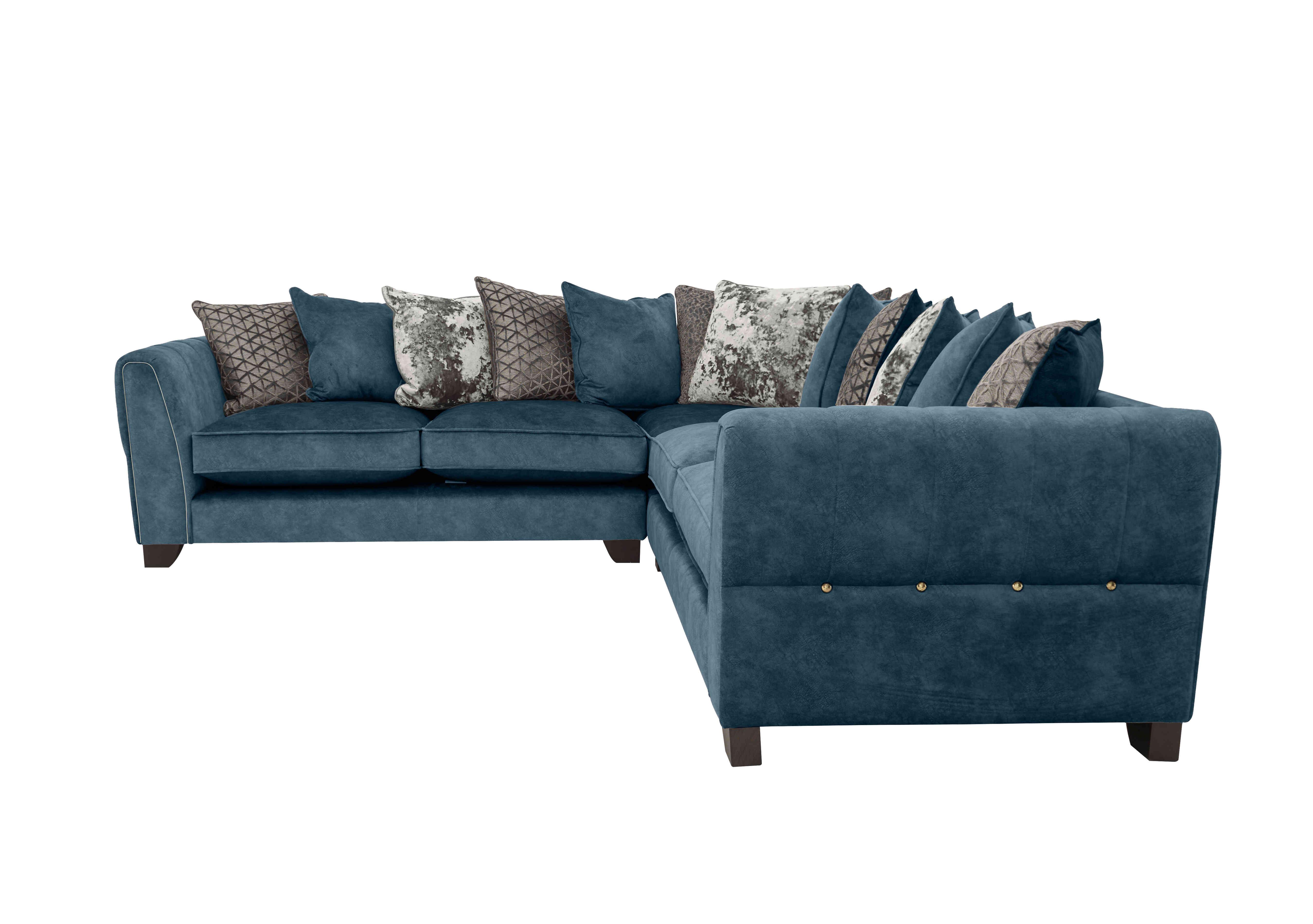 Ariana Large Fabric Pillow Back Corner Sofa in Dapple Ocean Brass Insert on Furniture Village