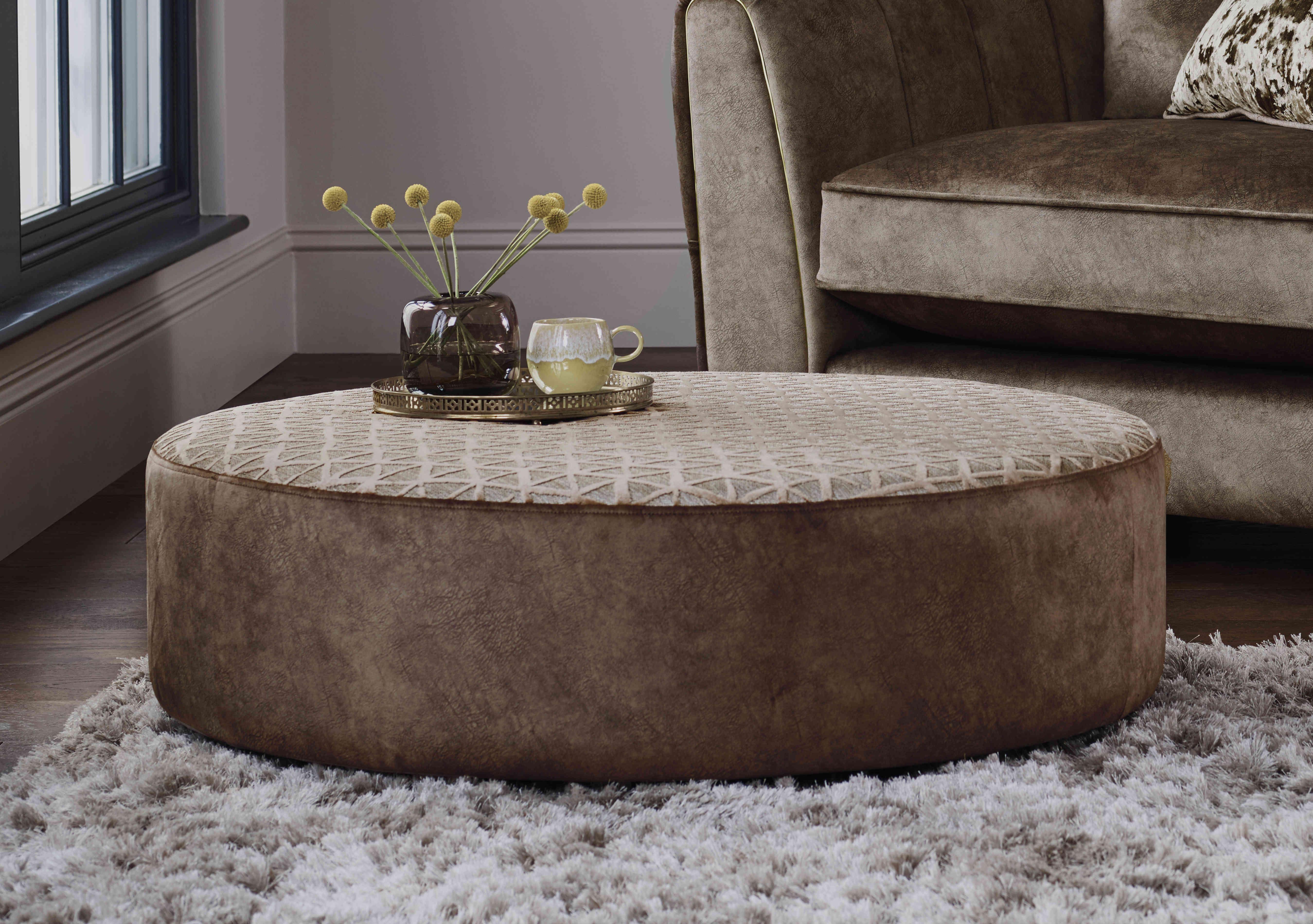 Ariana Fabric Twister Footstool in  on Furniture Village